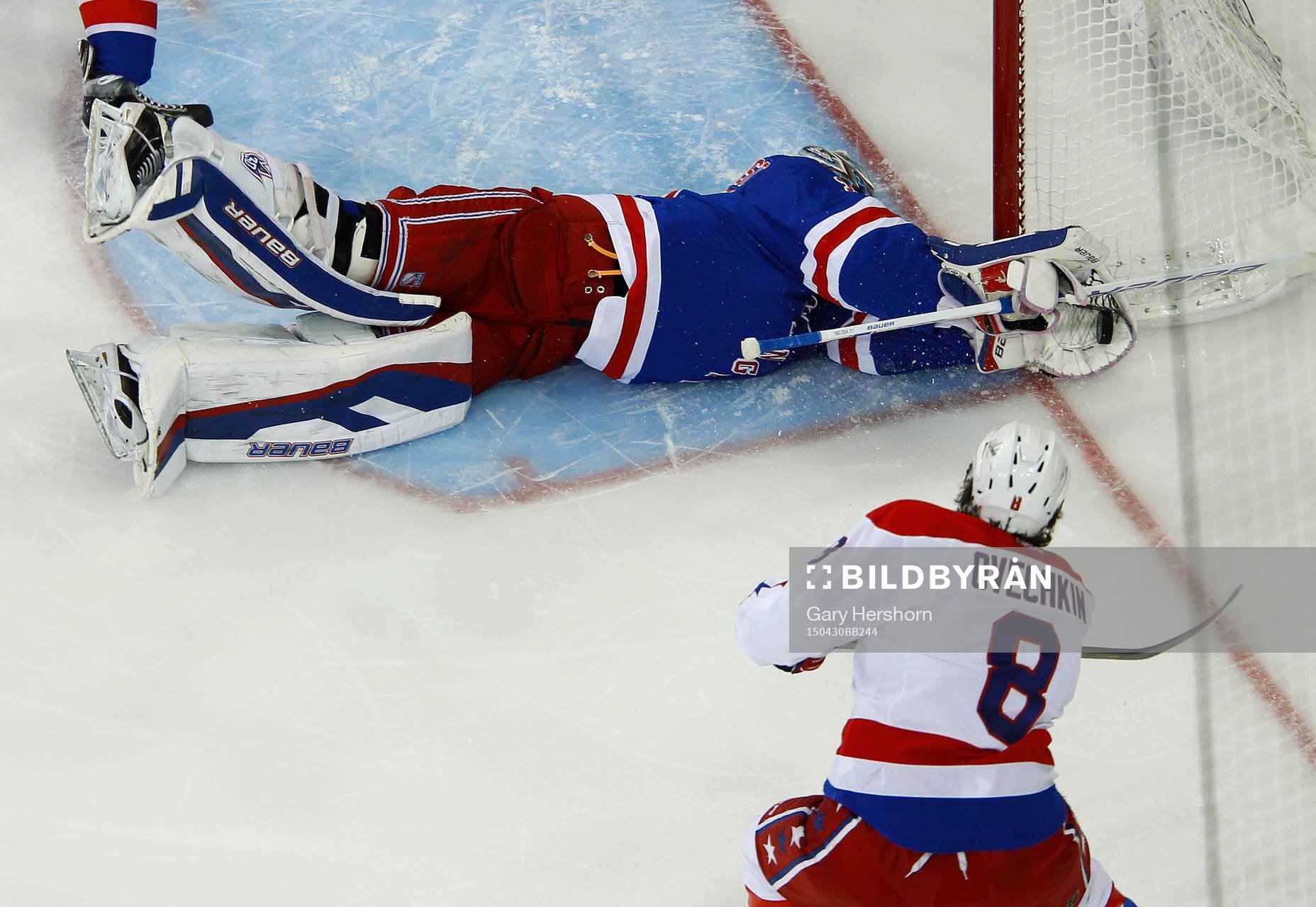 New York Rangers goalie Henrik Lundqvist makes a save