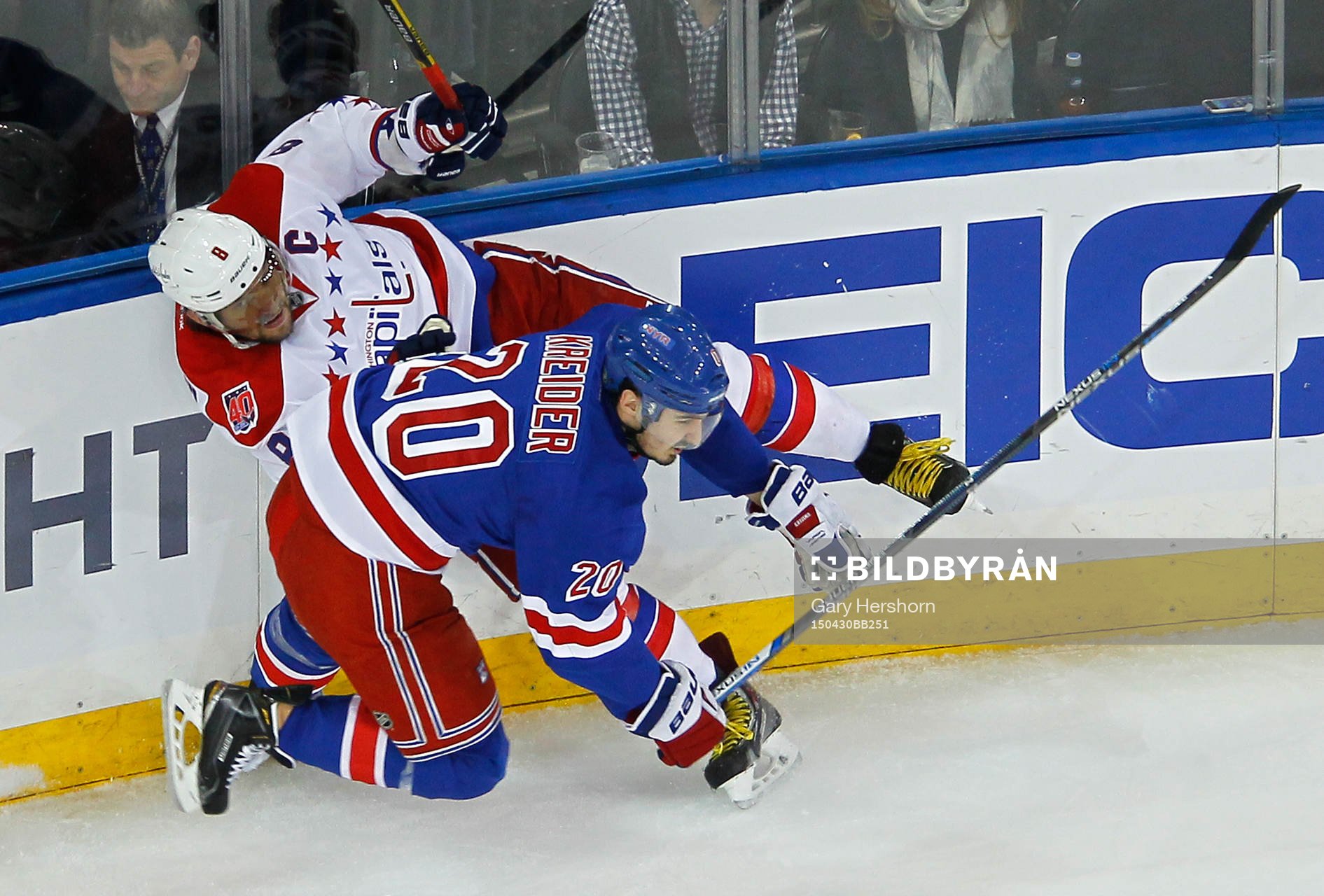 New York Rangers Chris Kreider checks Washington Capitals