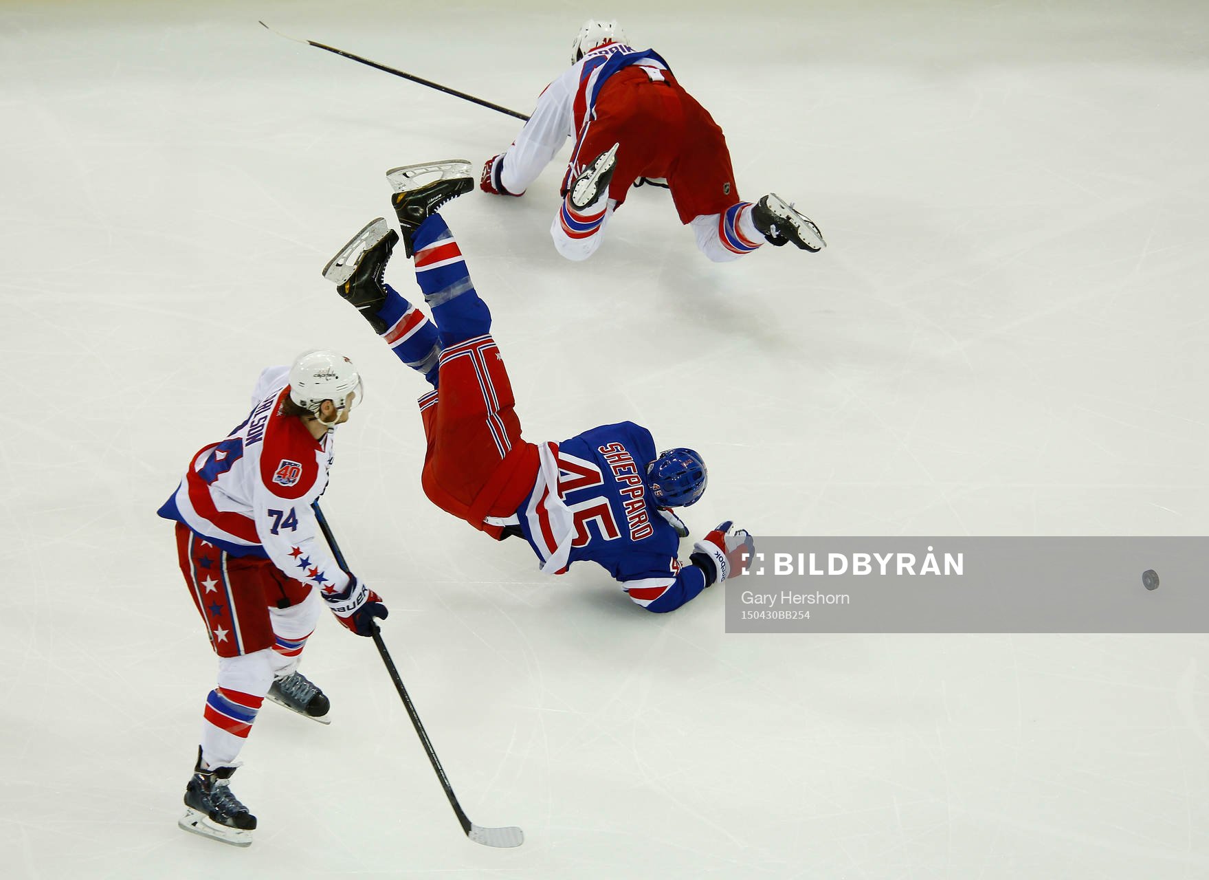 New York Rangers James Sheppard is sent flying by