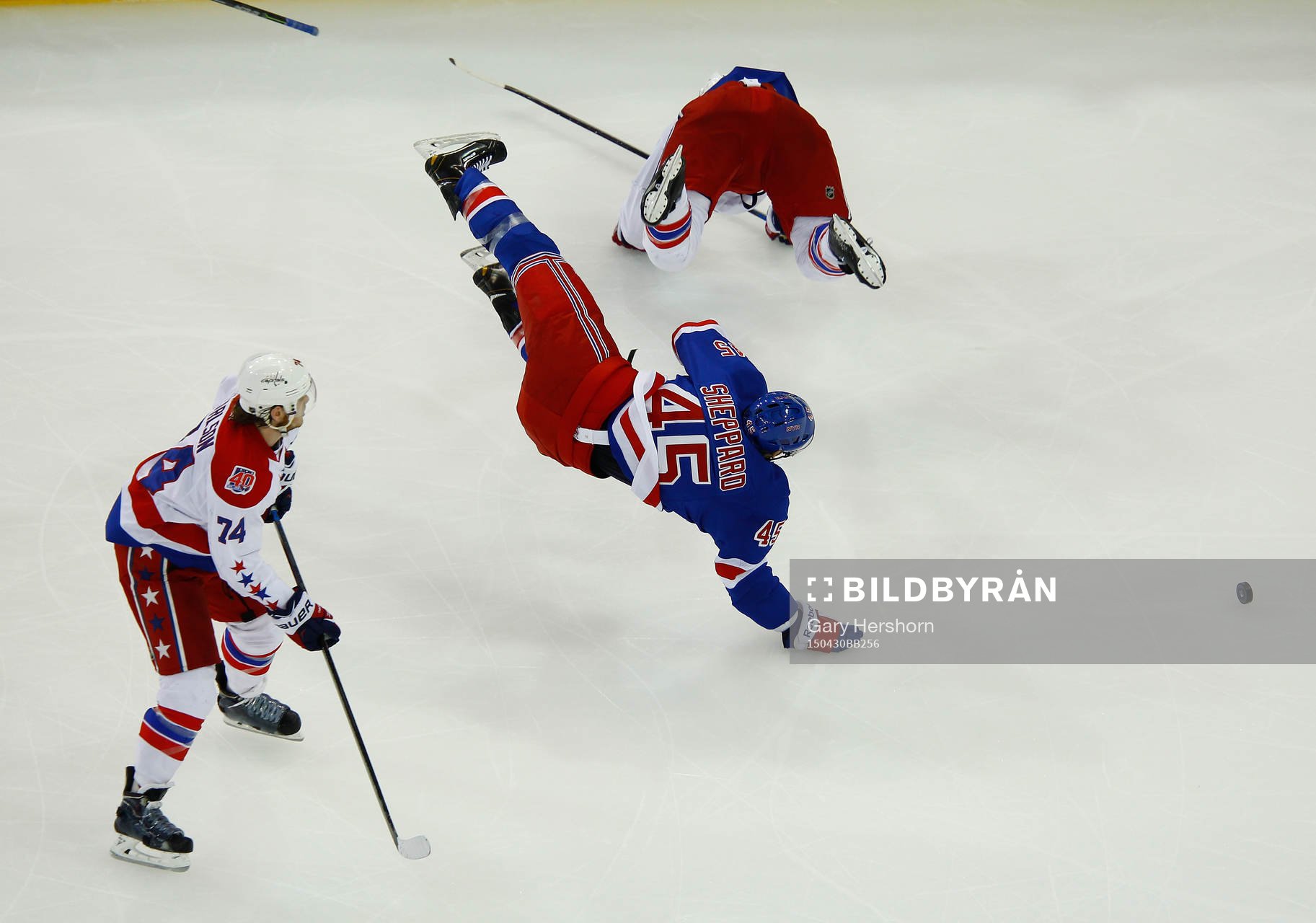 New York Rangers James Sheppard is sent flying by