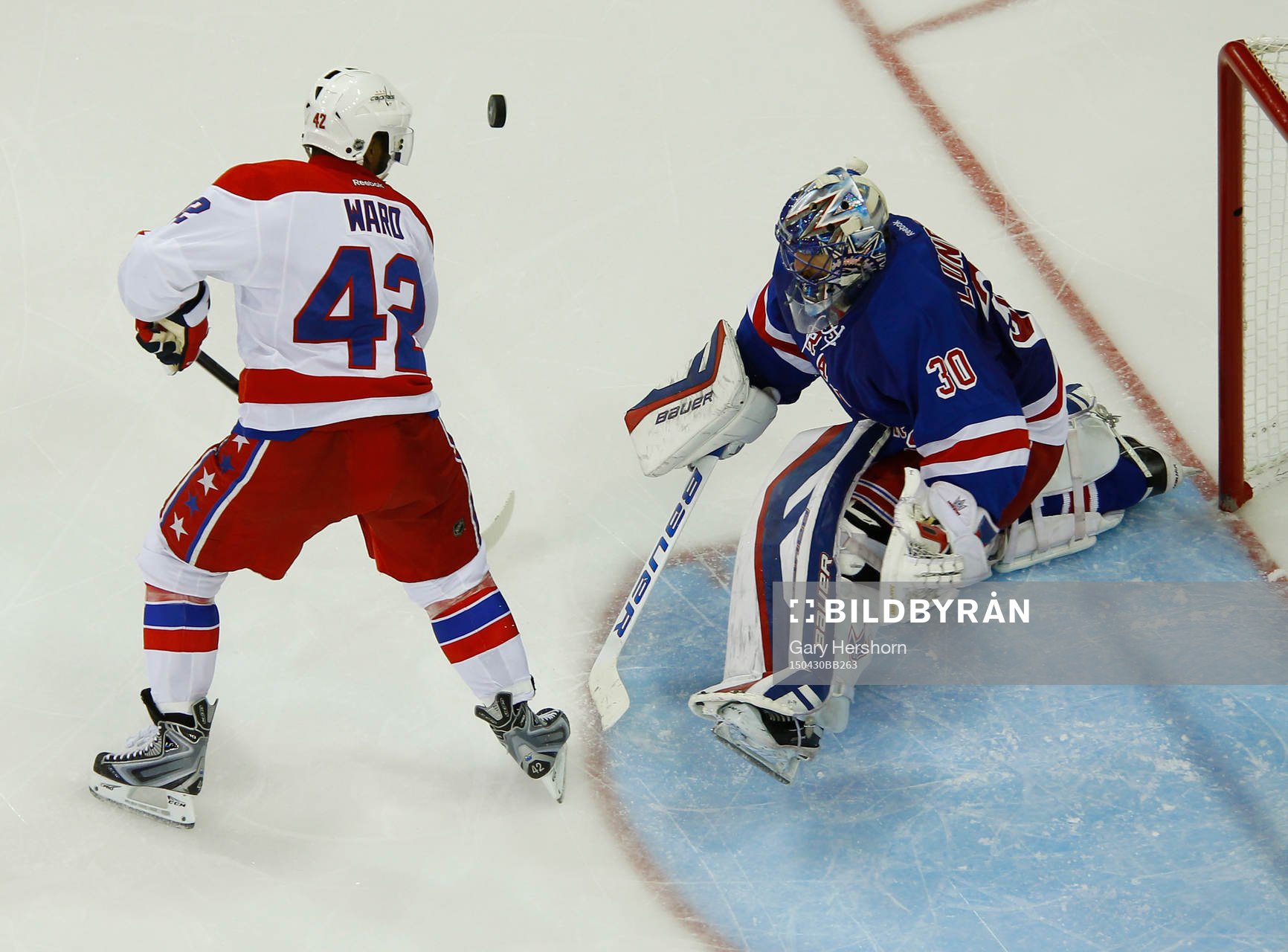 New York Rangers goalie Henrik Lundqvist makes a save
