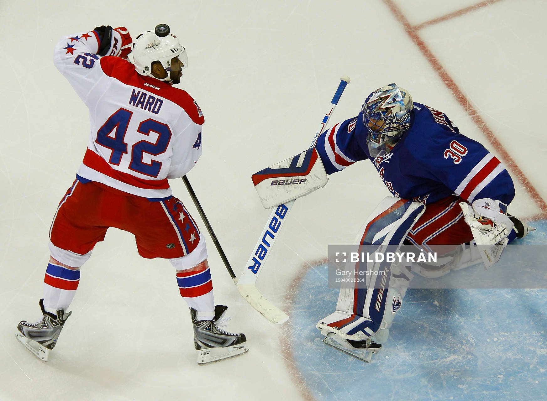 New York Rangers goalie Henrik Lundqvist makes a save