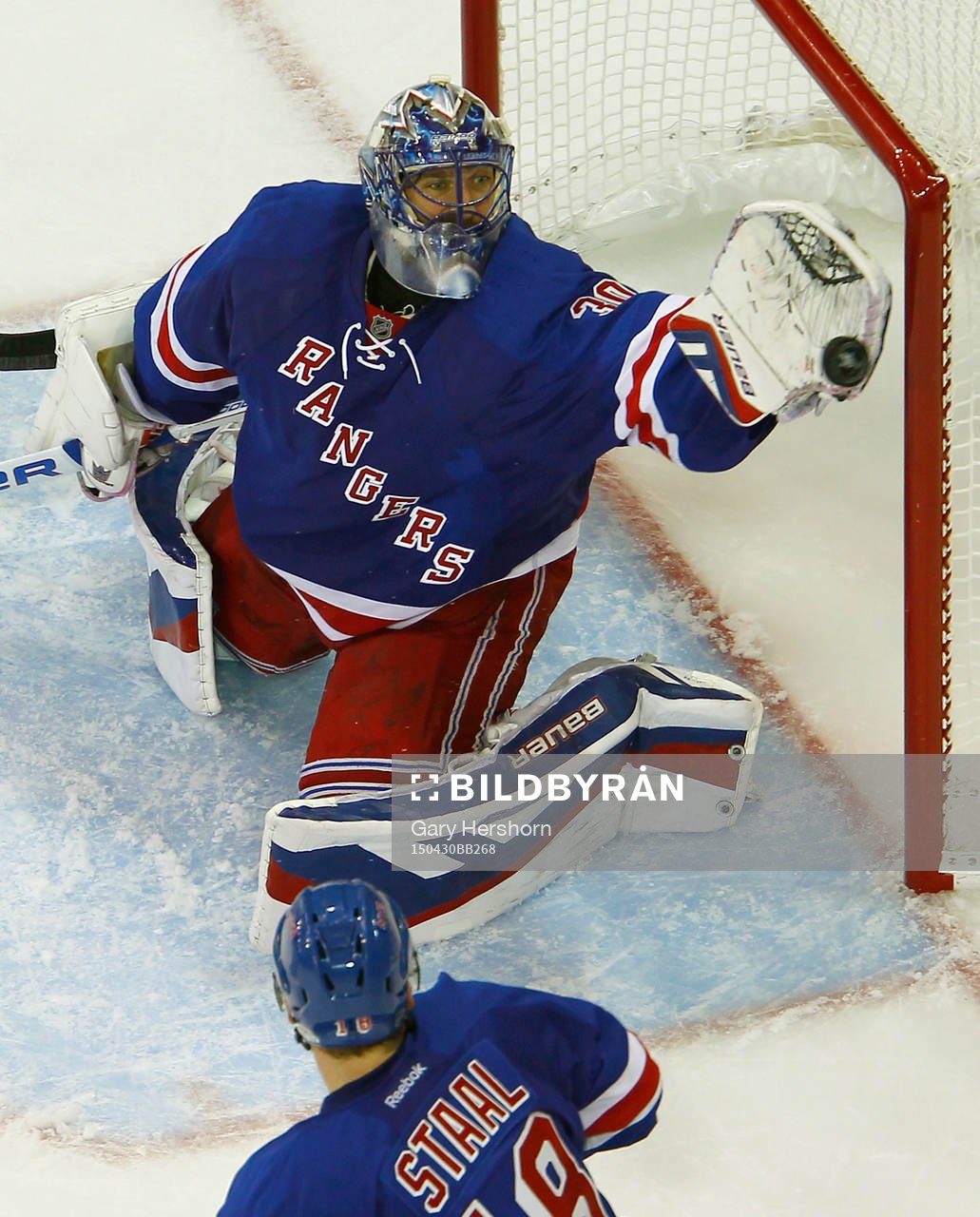 New York Rangers goalie Henrik Lundqvist makes a save