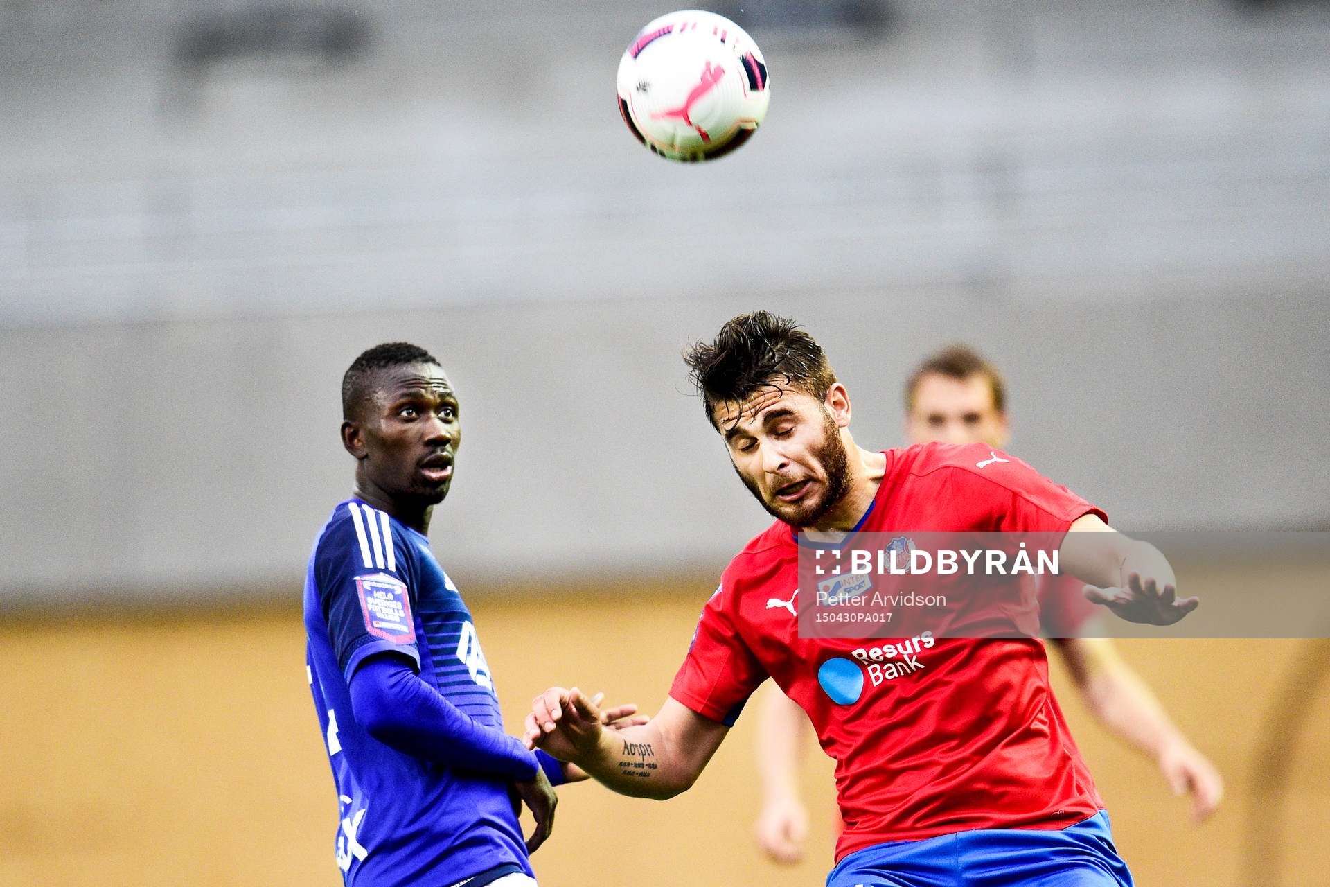 Sundsvalls Pa Amat Dibba och Helsingborgs Astrit Ajdarevic i en nickduell under fotbollsmatchen i Allsvenskan mellan Helsingborg och GIF Sundsvall den 30 april 2015 i Helsingborg.