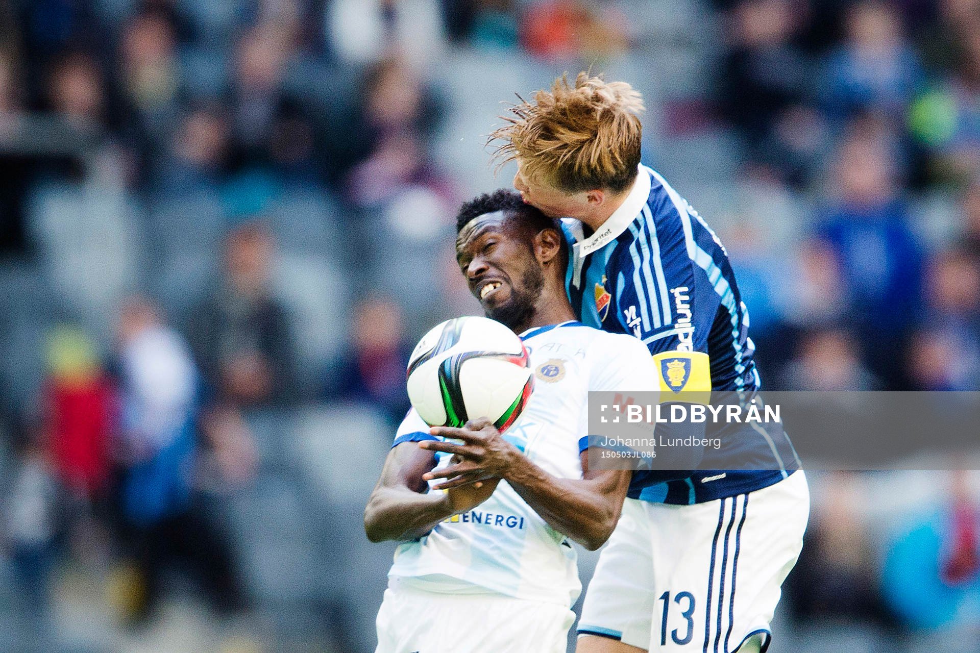 Gefles Dioh Williams och Djurgårdens Emil Bergström under fotbollsmatchen i Allsvenskan mellan Djurgården och Gefle den 3 maj 2015 i Stockholm.