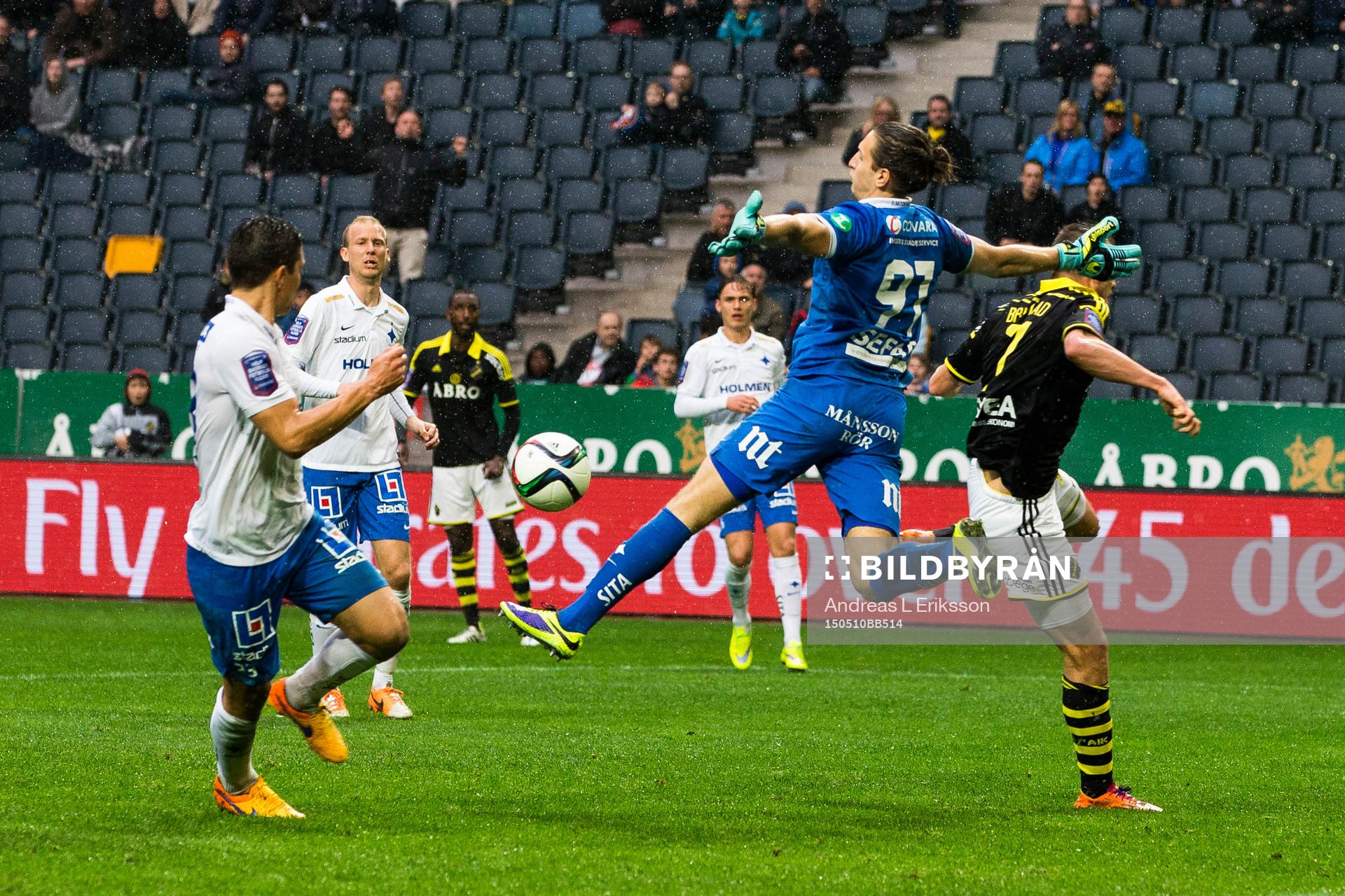 Norrköpings målvakt David Mitov Nilsson gör sig stor och räddar ett anfall från AIK:s Fredrik Brustad under fotbollsmatchen i Allsvenskan mellan AIK och Norrköping den 10 maj 2015 i Stockholm.