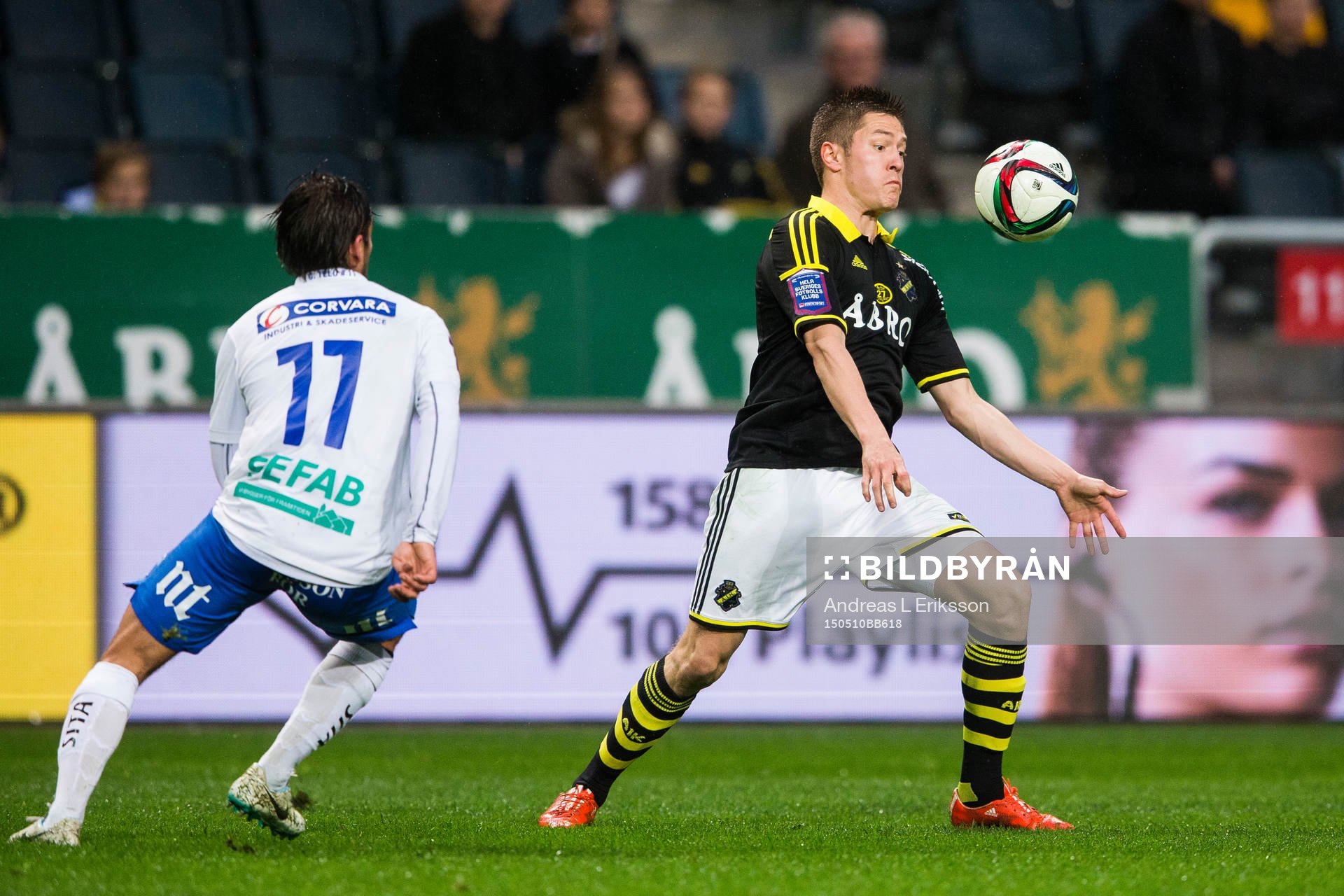 Norrköpings Christopher Nilsson Telo och AIK:s Haukur Hauksson under fotbollsmatchen i Allsvenskan mellan AIK och Norrköping den 10 maj 2015 i Stockholm.