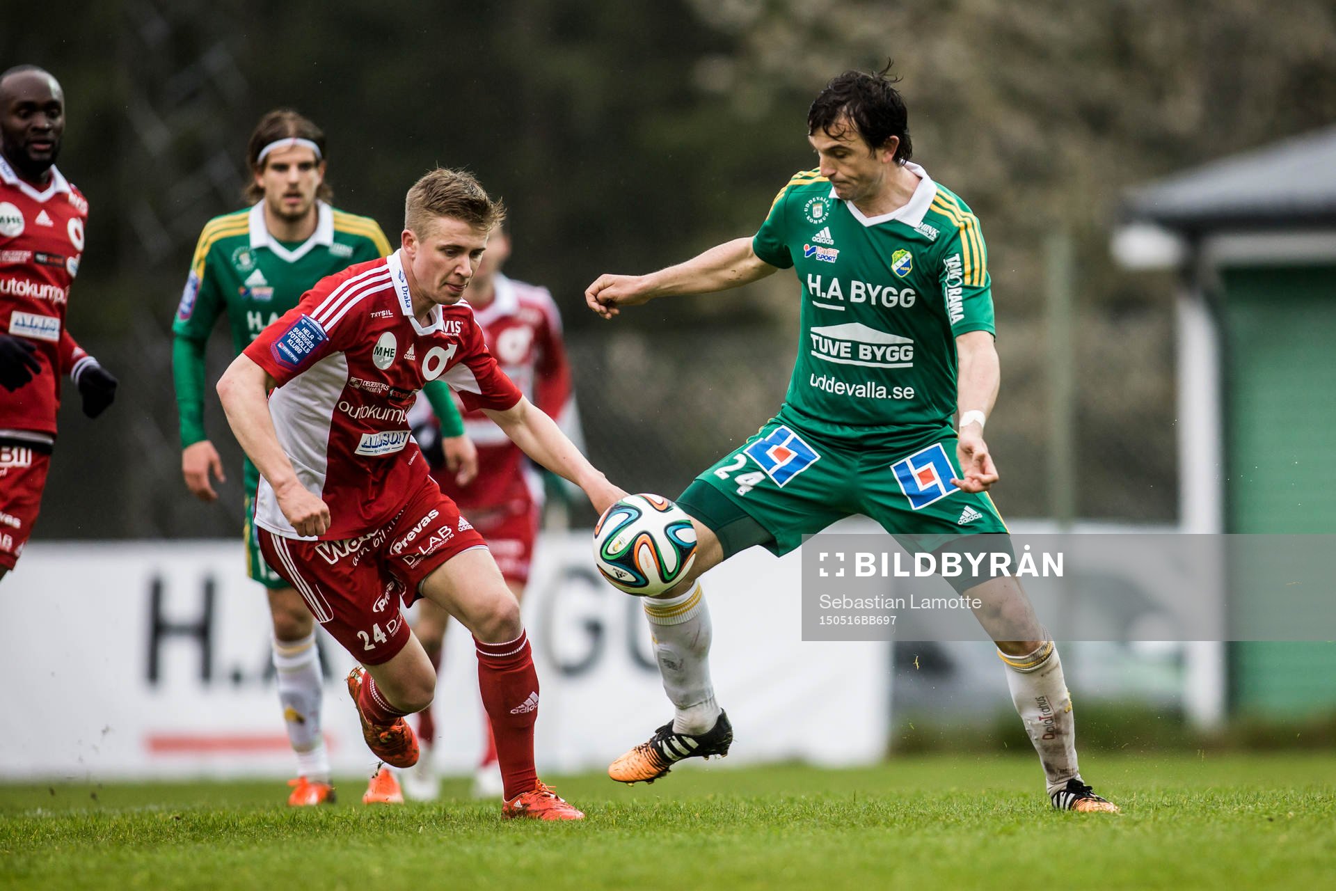 Ljungskiles Aleksandar Kitic med bollen före Degerfors Ludvig Fritzson under fotbollsmatchen i Superettan mellan Ljungskile och Degerfors den 16 maj 2015 i Ljungskile.