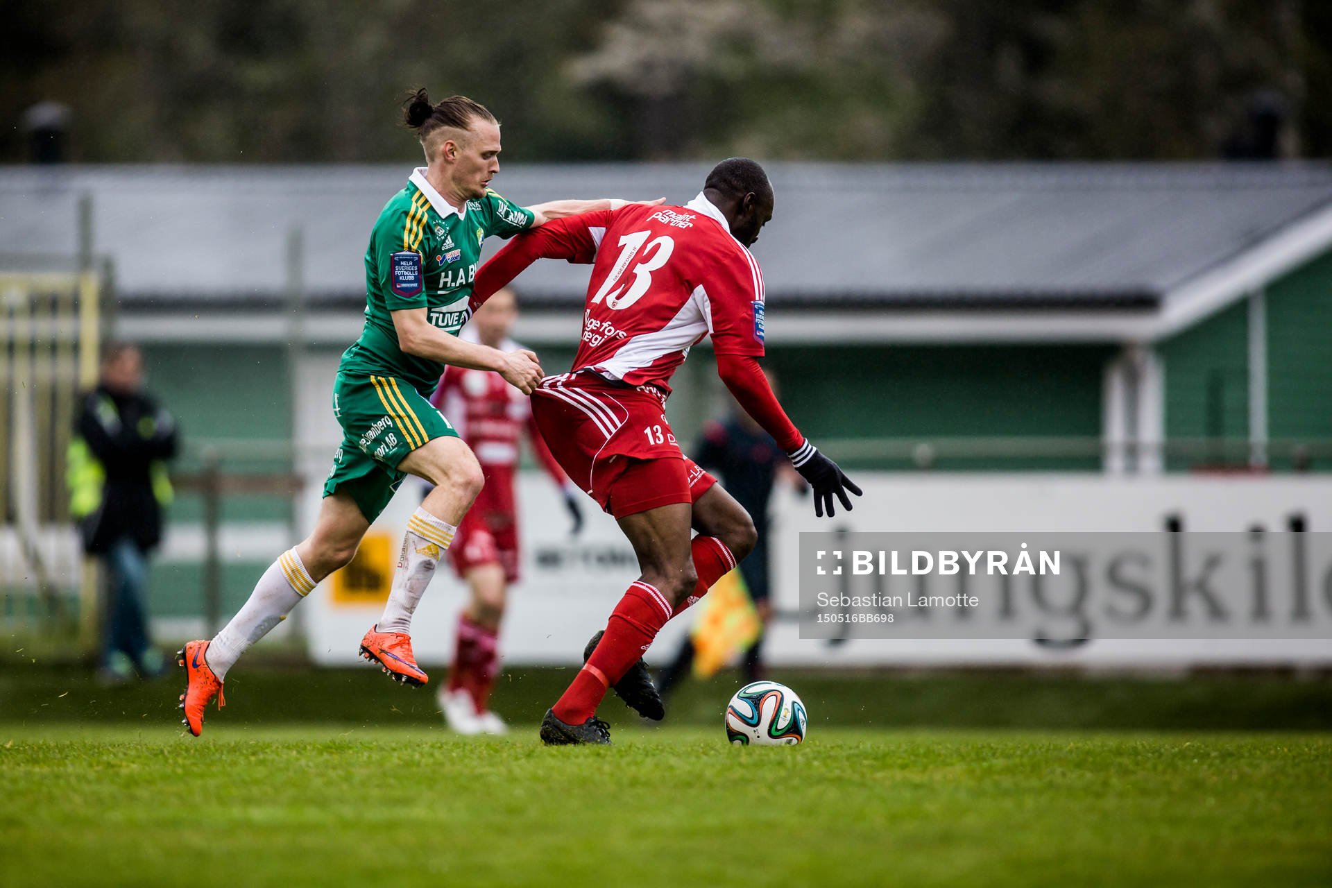 Ljungskiles Jonas Lindberg drar Degerfors Boris Lumbana i byxorna under fotbollsmatchen i Superettan mellan Ljungskile och Degerfors den 16 maj 2015 i Ljungskile.