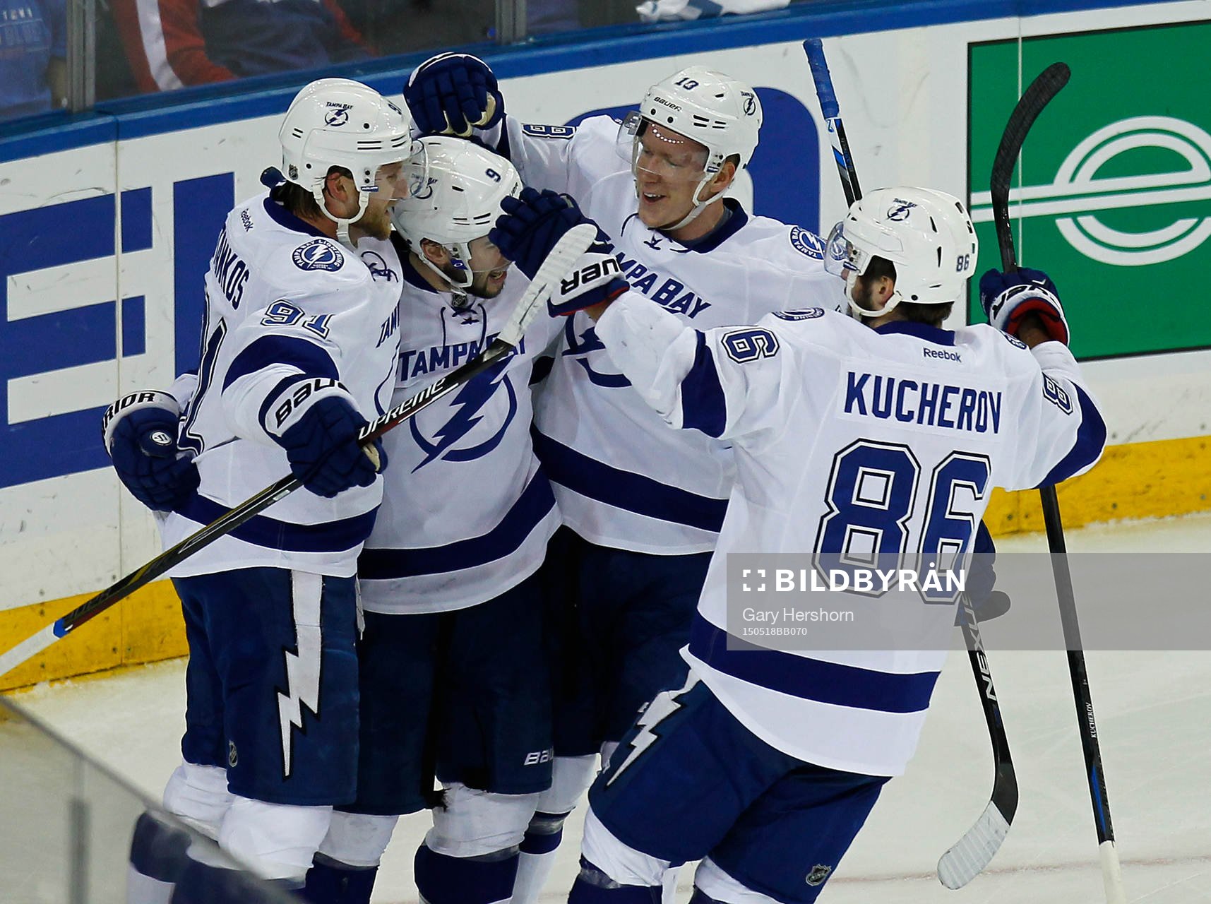 Tampa Bay Lightning Tyler Johnson (2nd L) celebrates his