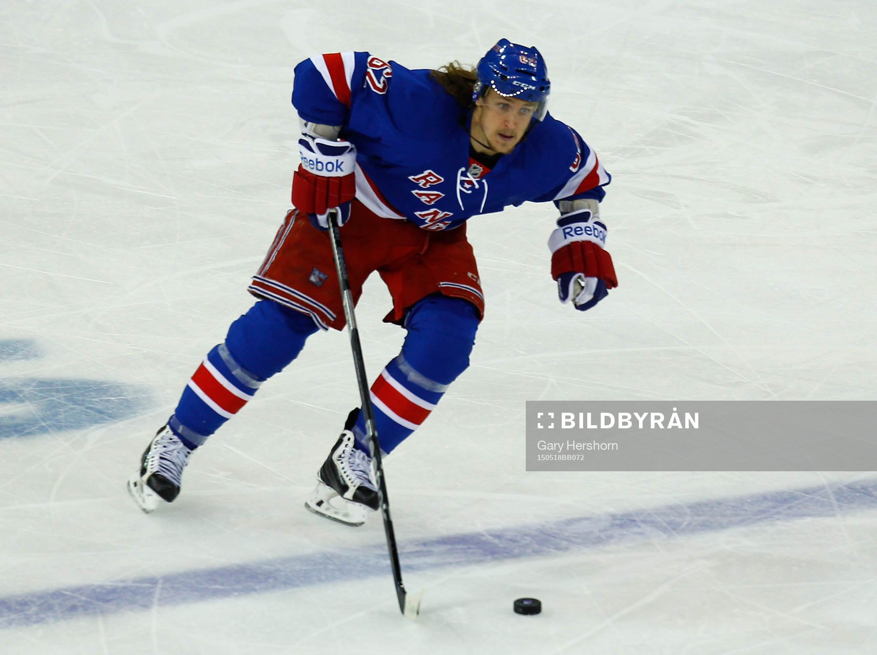 New York Rangers Carl Hagelin skates with the puck in the
