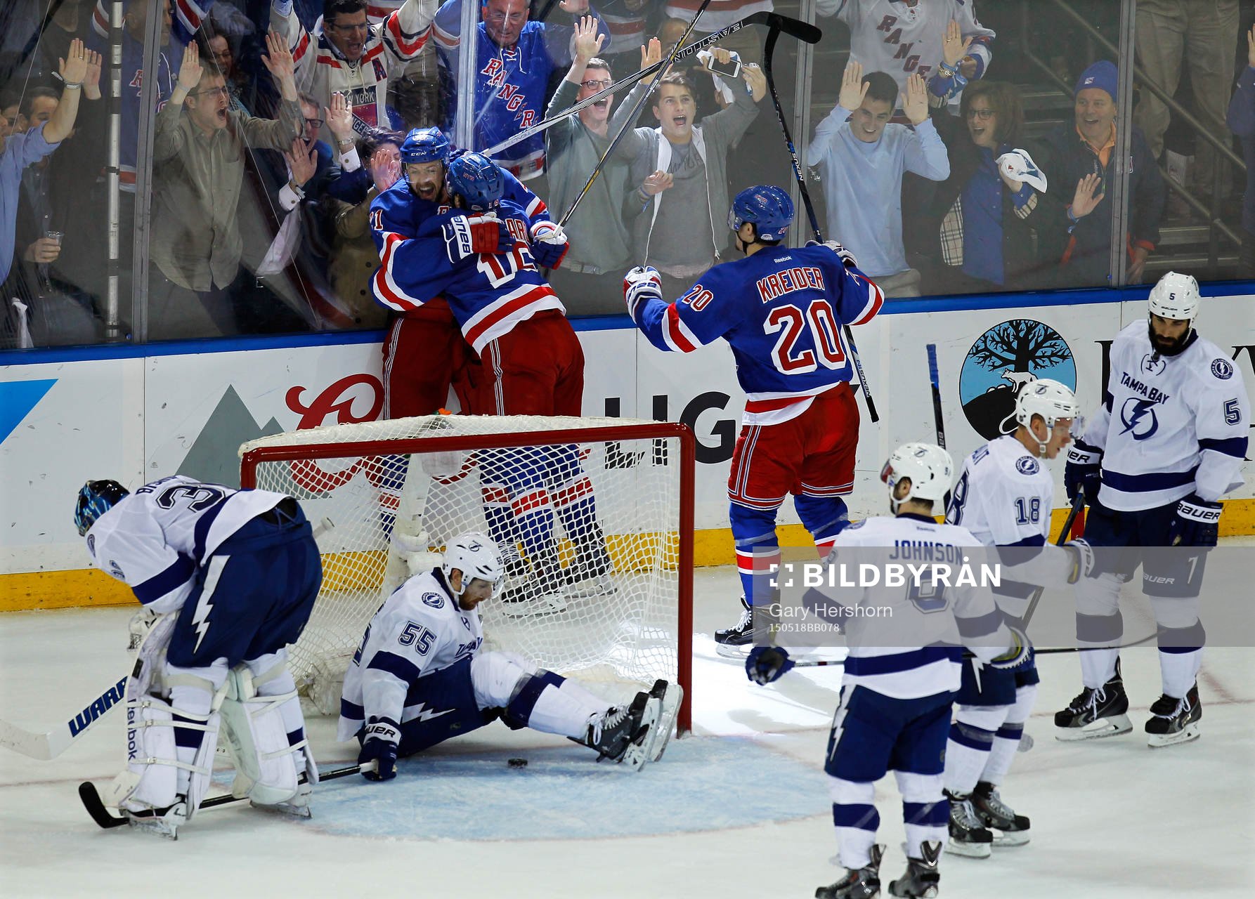 New York Rangers Derek Stepan (rear L) celebrates scoring