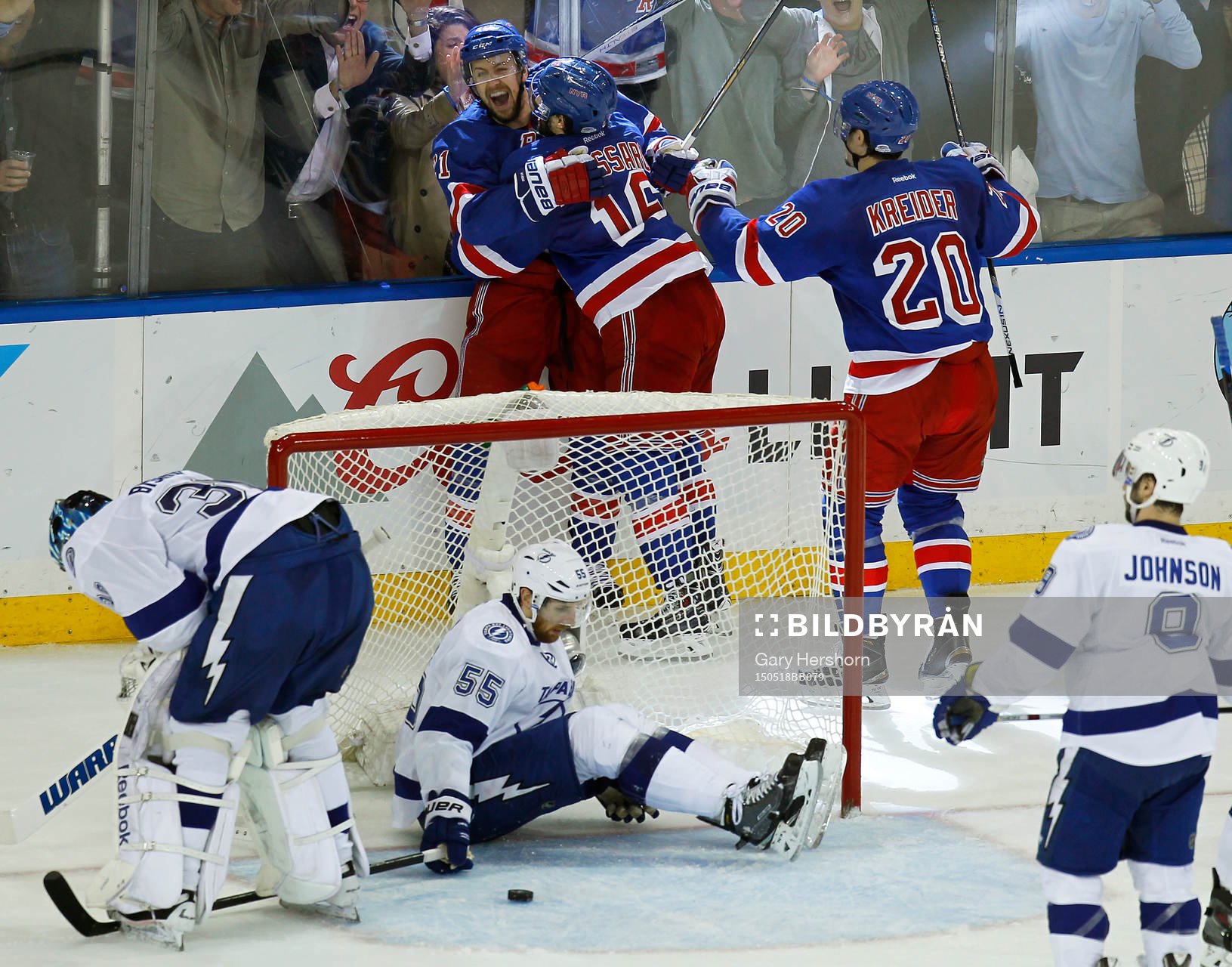 New York Rangers Derek Stepan (rear L) celebrates scoring