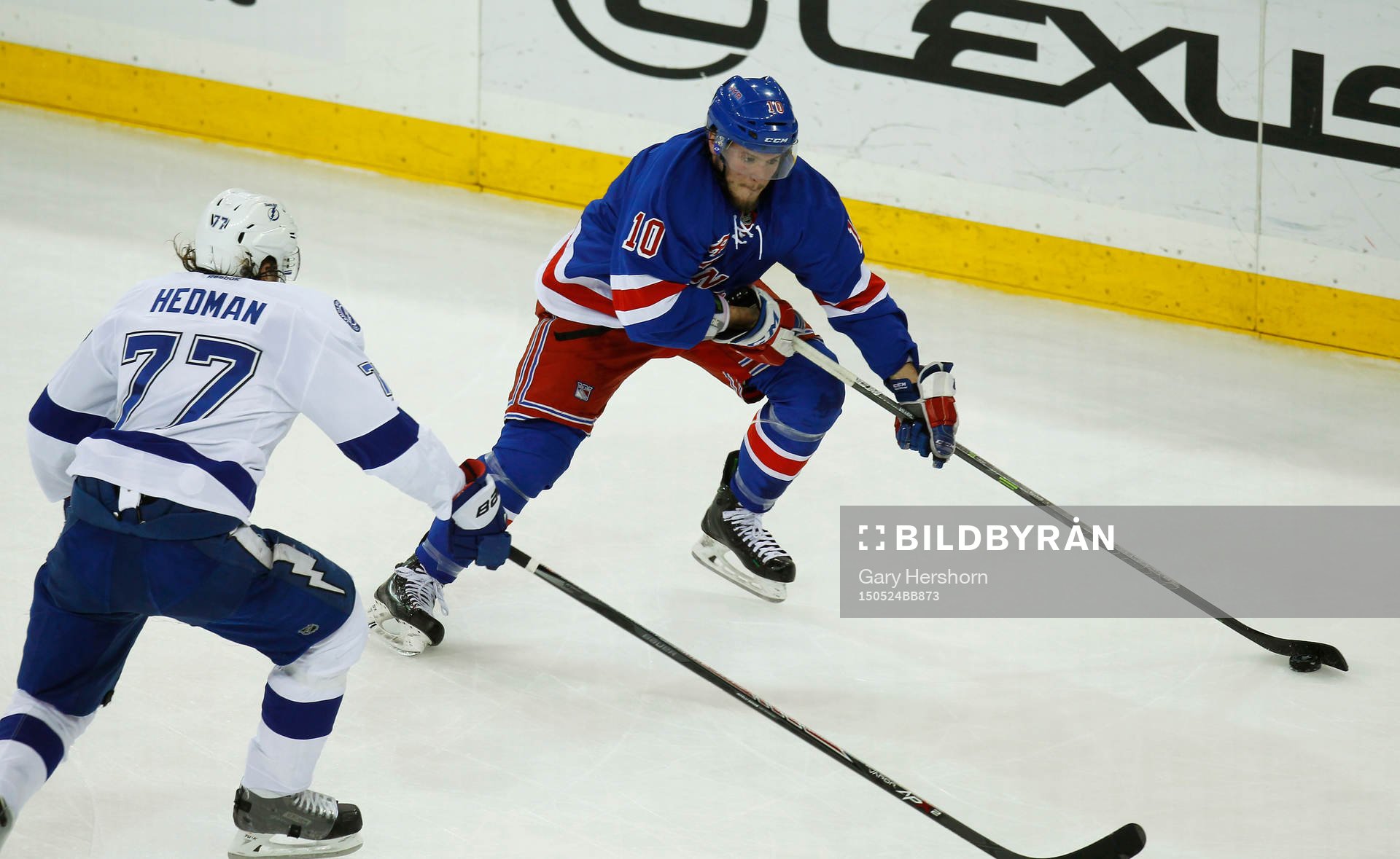 New York Rangers J.T. Miller skates past Tampa Bay