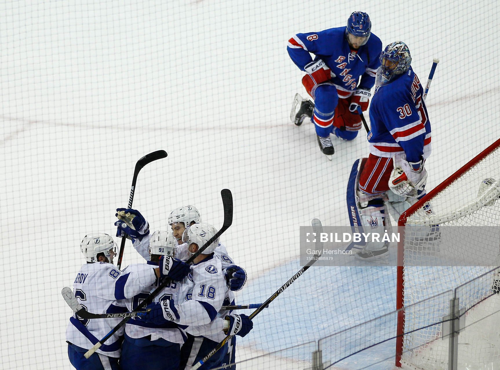 New York Rangers goalie Henrik Lundqvist (R) and Kevin