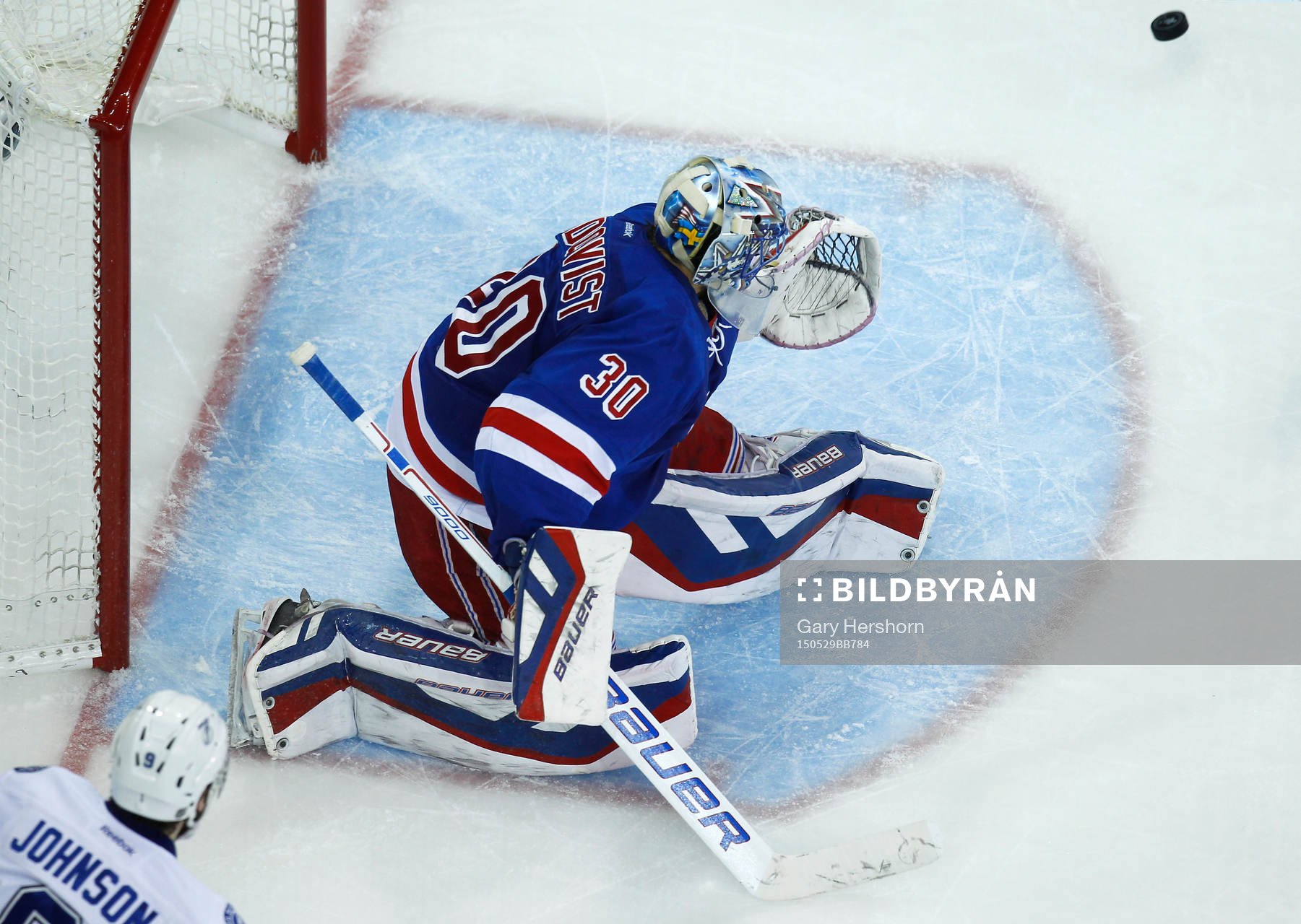 New York Rangers goalie Henrik Lundqvist makes a save