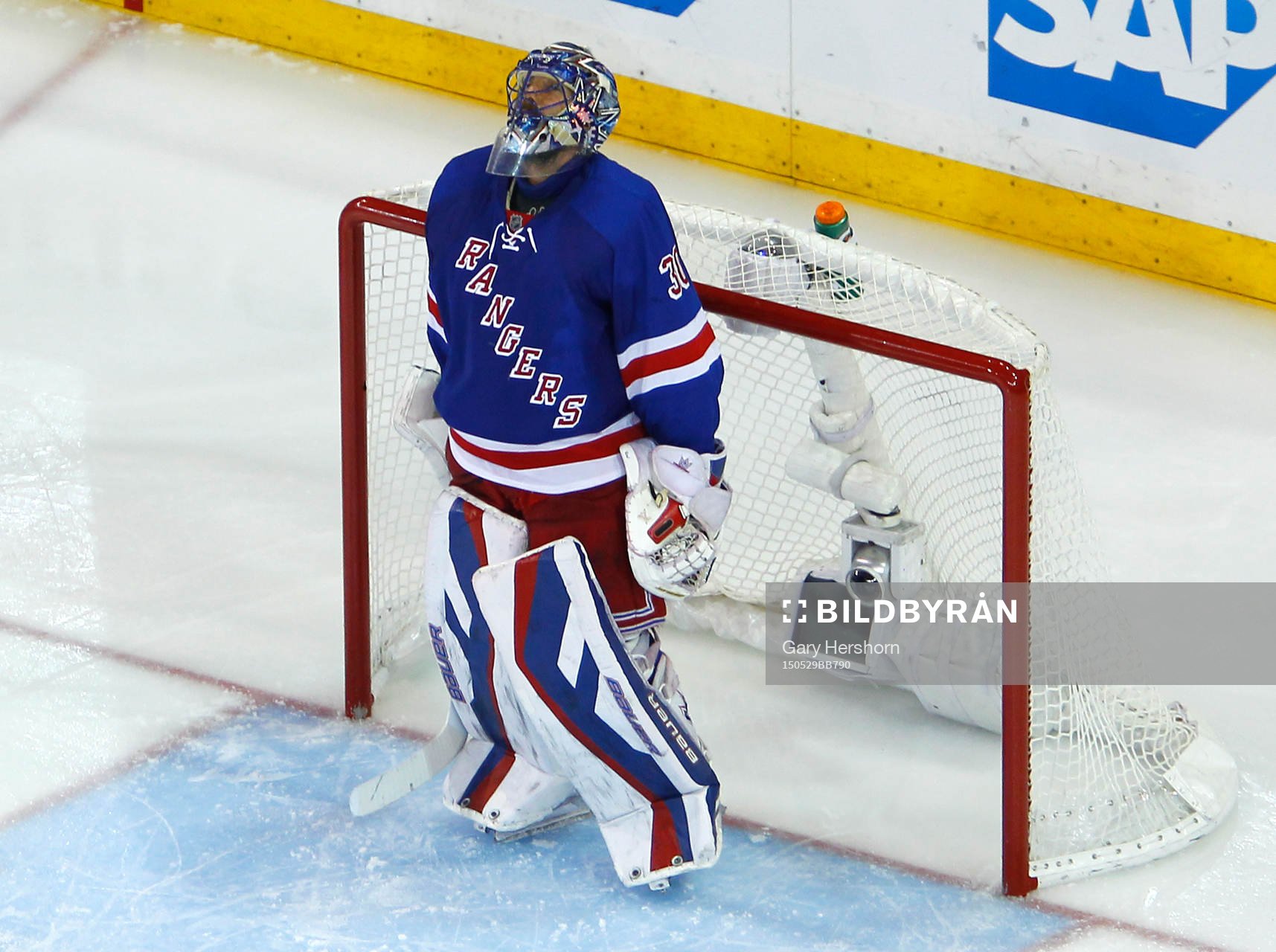 New York Rangers goalie Henrik Lundqvist stands in the