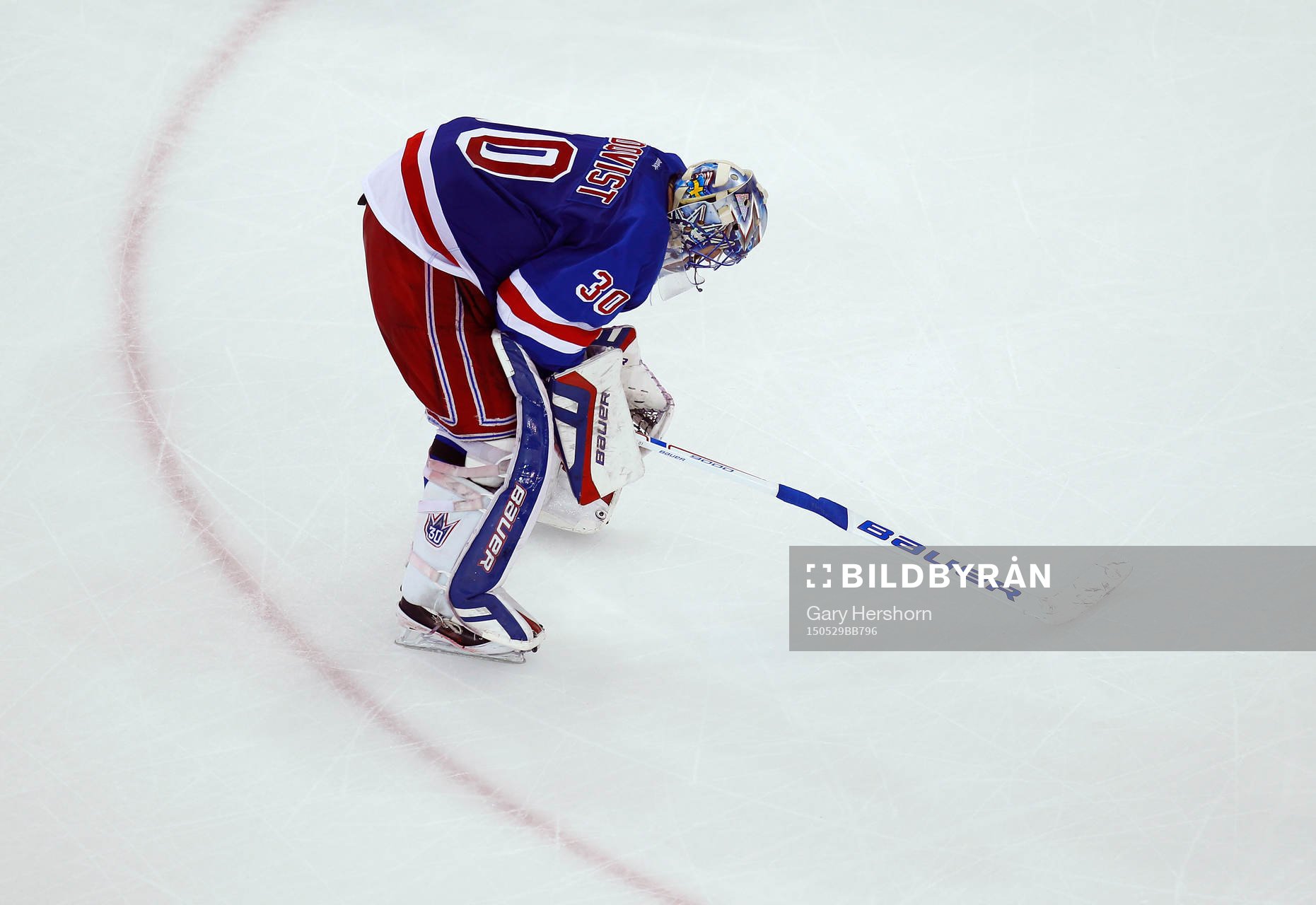 New York Rangers goalie Henrik Lundqvist skates around the
