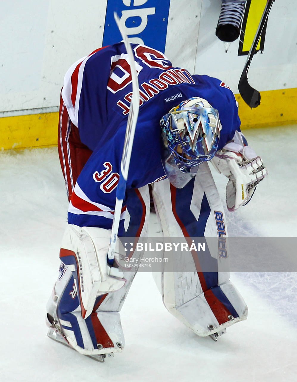 New York Rangers goalie Henrik Lundqvist slams his stick