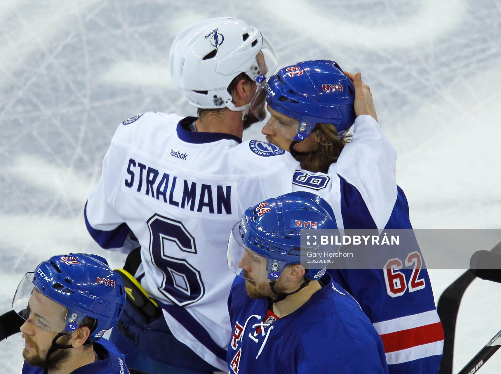 Tampa Bay Lighting Anton Stralman (L) consoles New York