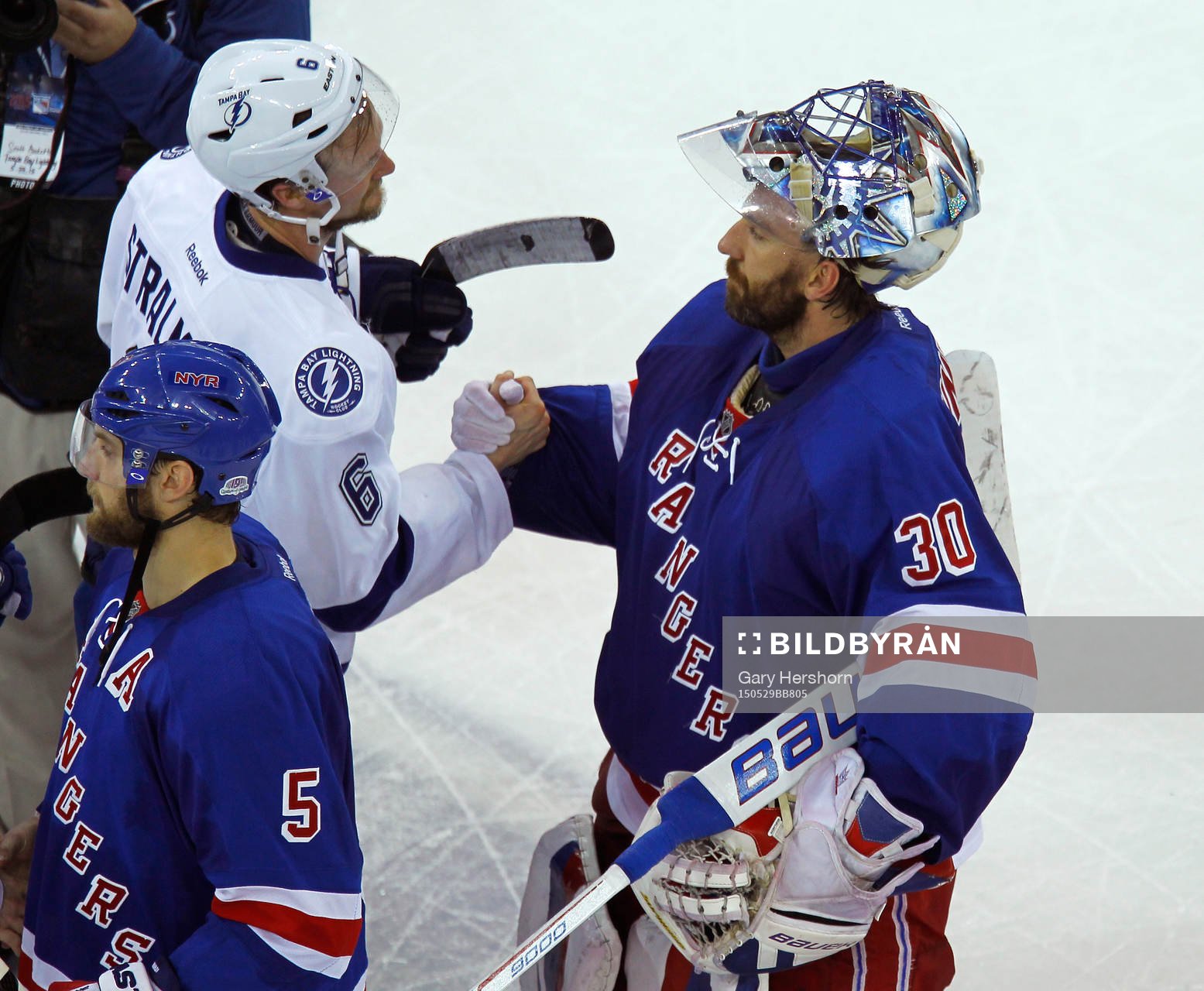 Tampa Bay Lighting Anton Stralman (L) shakes hands with New