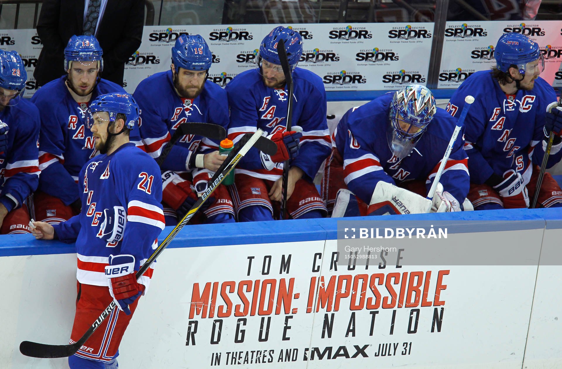 New York Rangers goalie Henrik Lundqvist (2nd R) sits