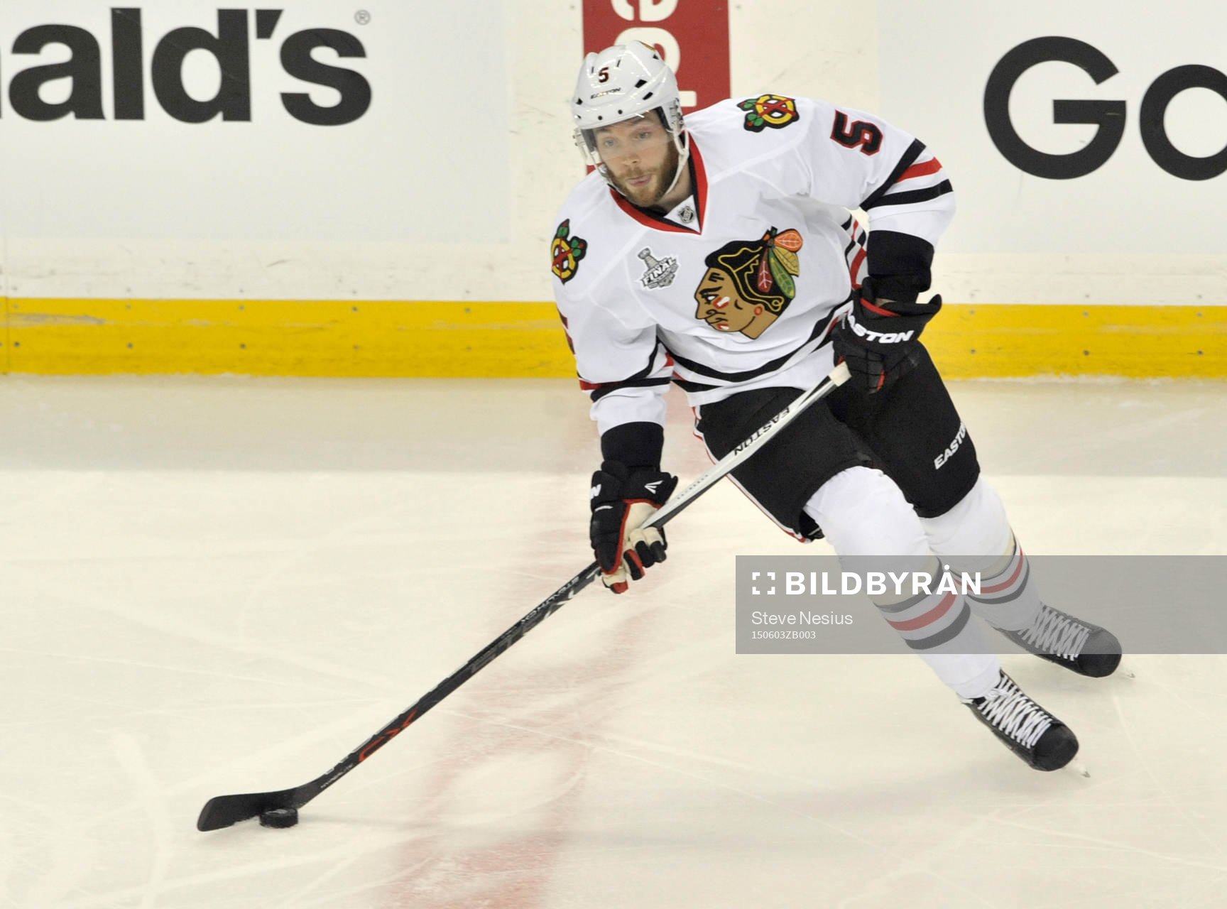 The Blackhawks' David Runblad skates through the neutral