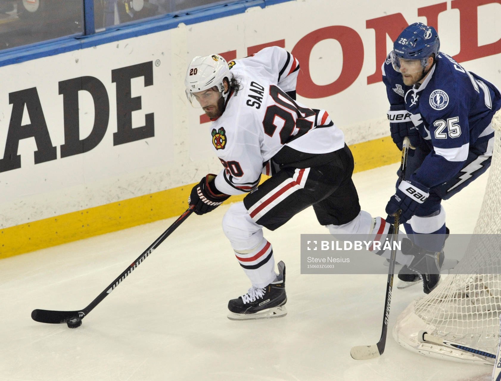 The Blackhawks' Brandon Saad (20) controls the puck