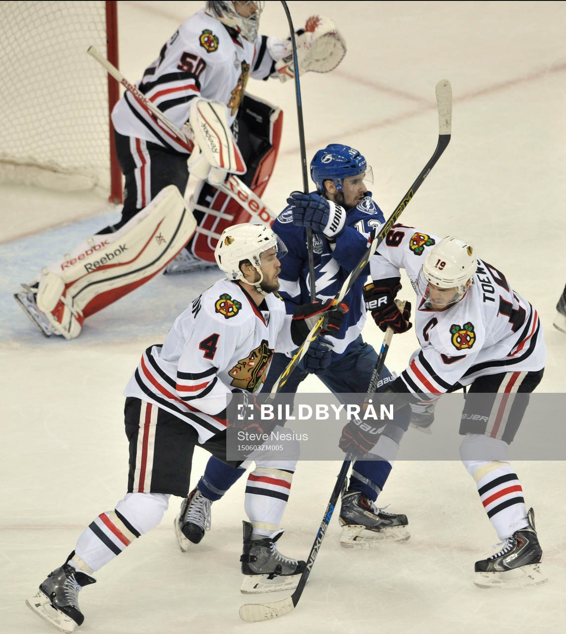 The Blackhawks' Niklas Hjalmarsson (4) and Jonathan Toews