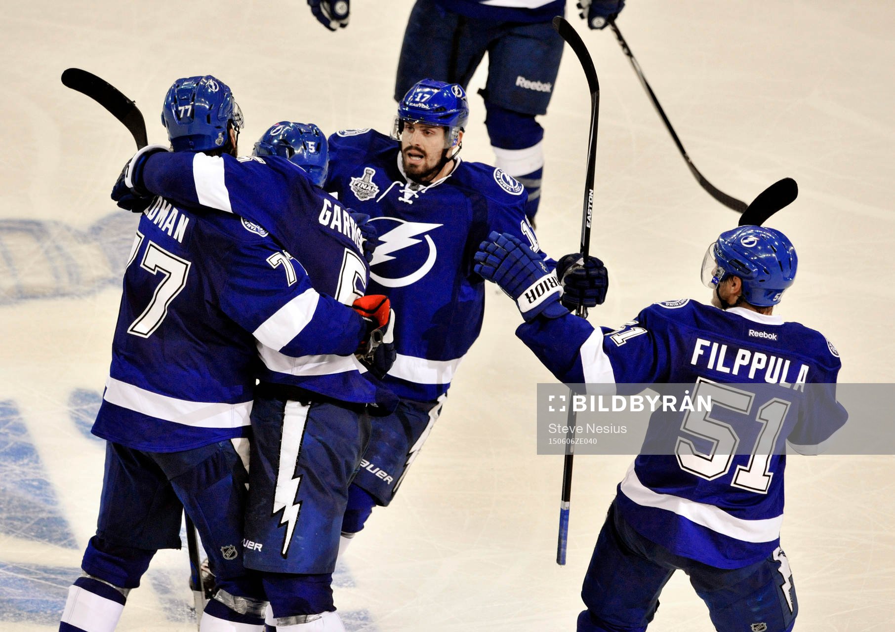The Lightning's Victor Hedman (77), Jason Garrison (5),
