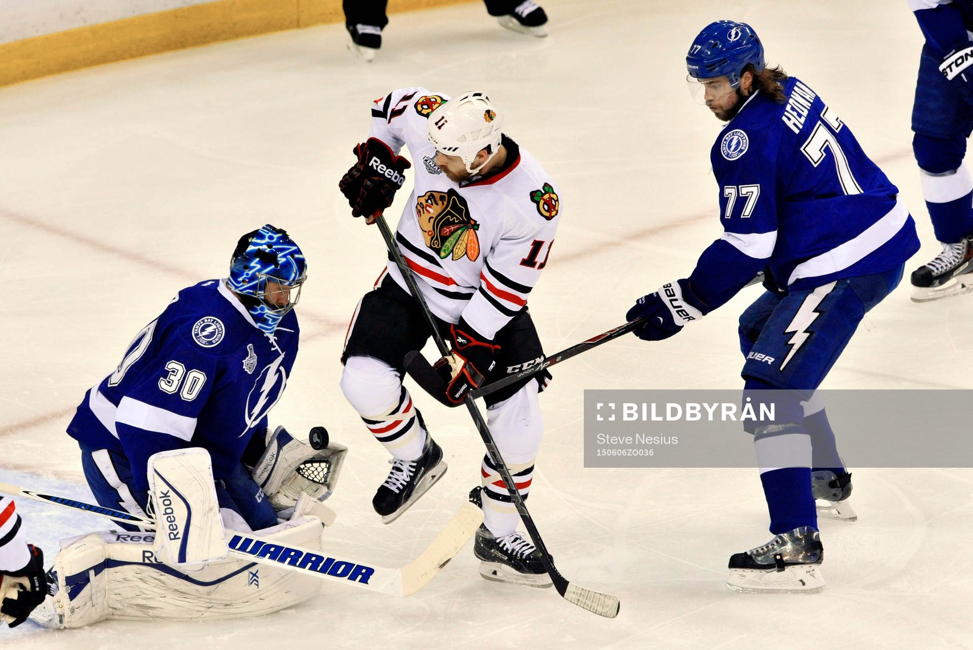 Lightning goalie Ben Bishop (30) stops a shot by Blackhawks