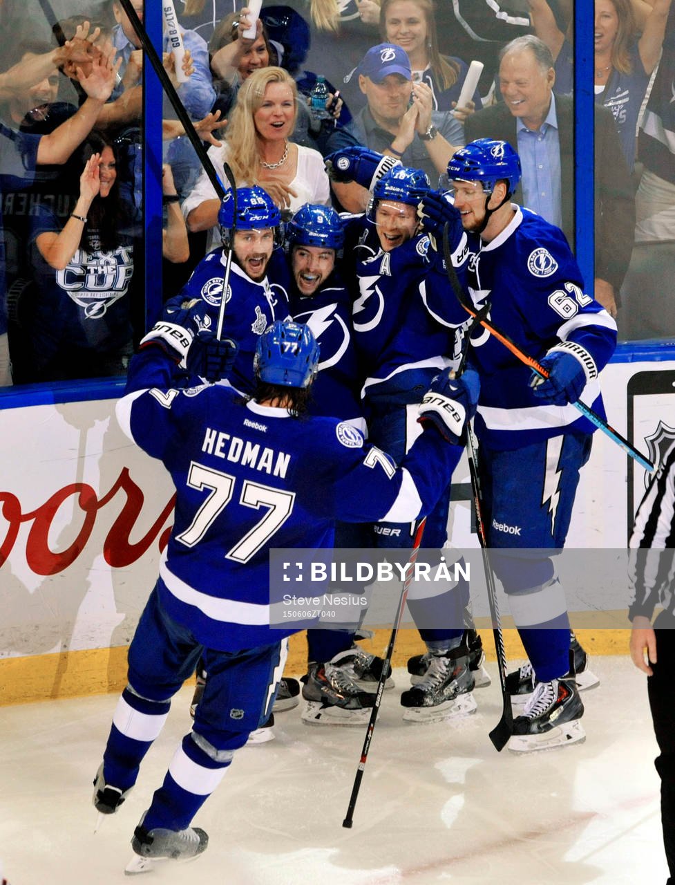 The Lightning's Victor Hedman (77), Andrej Sustr (62),