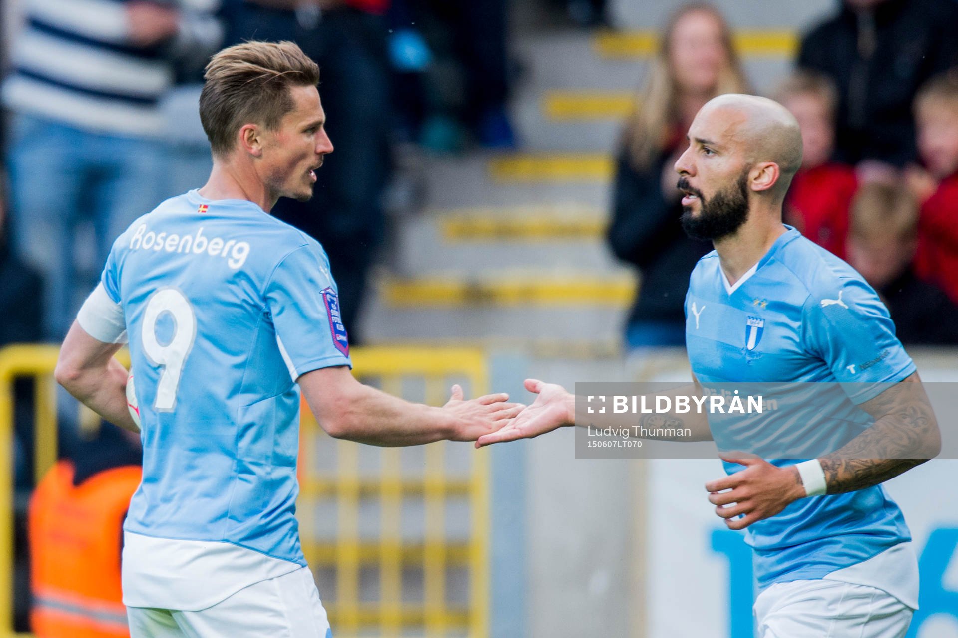 Malmö FFs Markus Rosenberg och Guillermo Molins firar Magnus Wolff Eikrem (ej i bild) gjort 1-1 under fotbollsmatchen i Allsvenskan mellan Malmö FF och Djurgården den 7 juini 2015 i Malmö.