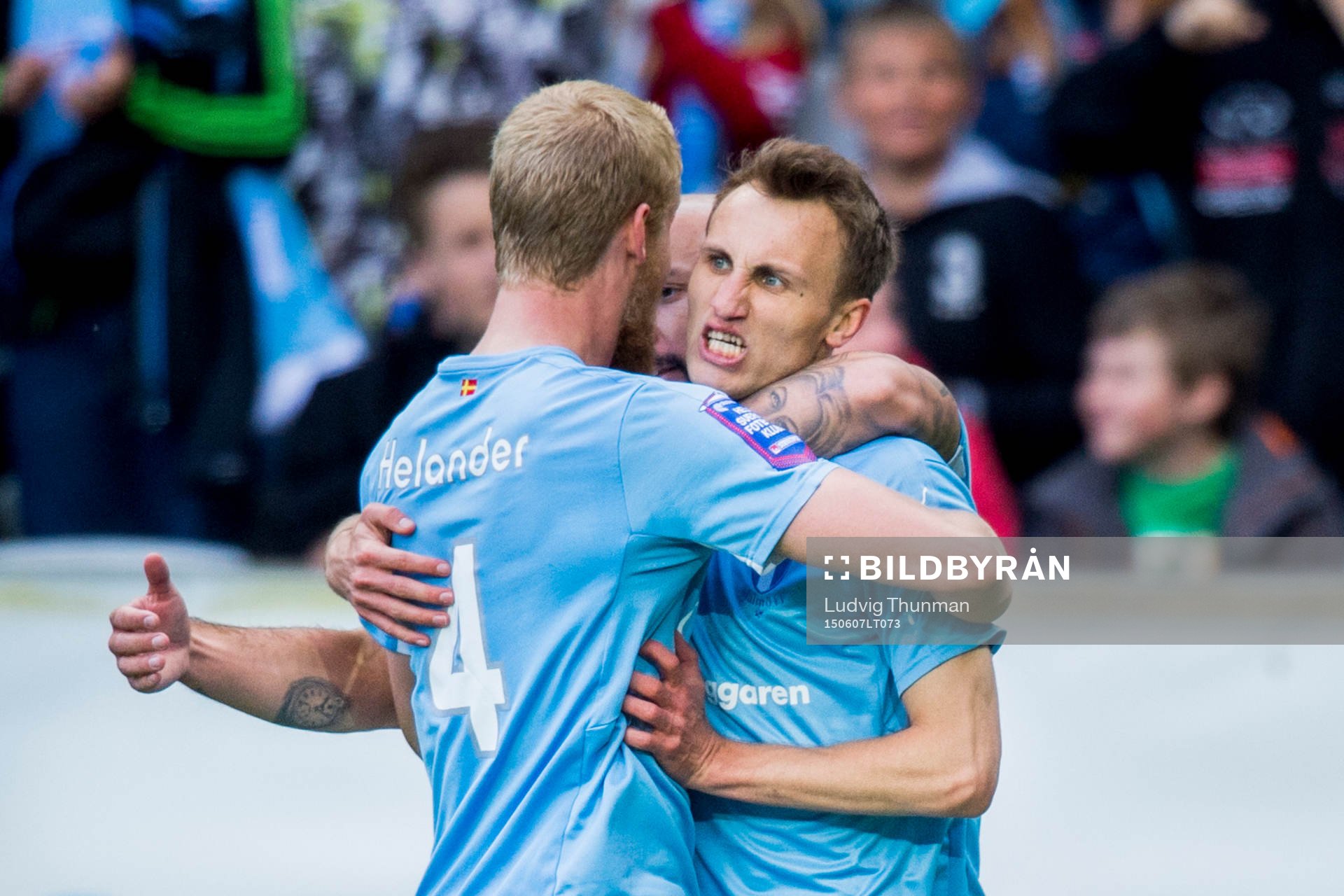 Malmö FFs Magnus Wolff Eikrem kramas om av Guillermo Molins och Filip Helander efter han gjort 1-1 under fotbollsmatchen i Allsvenskan mellan Malmö FF och Djurgården den 7 juini 2015 i Malmö.