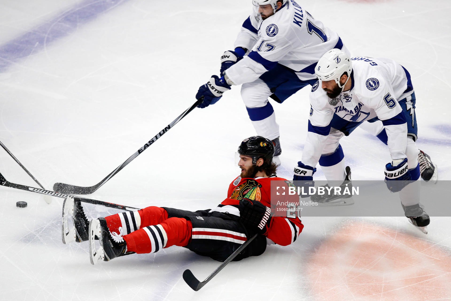 Chicago Blackhawks left wing Brandon Saad (20) falls while