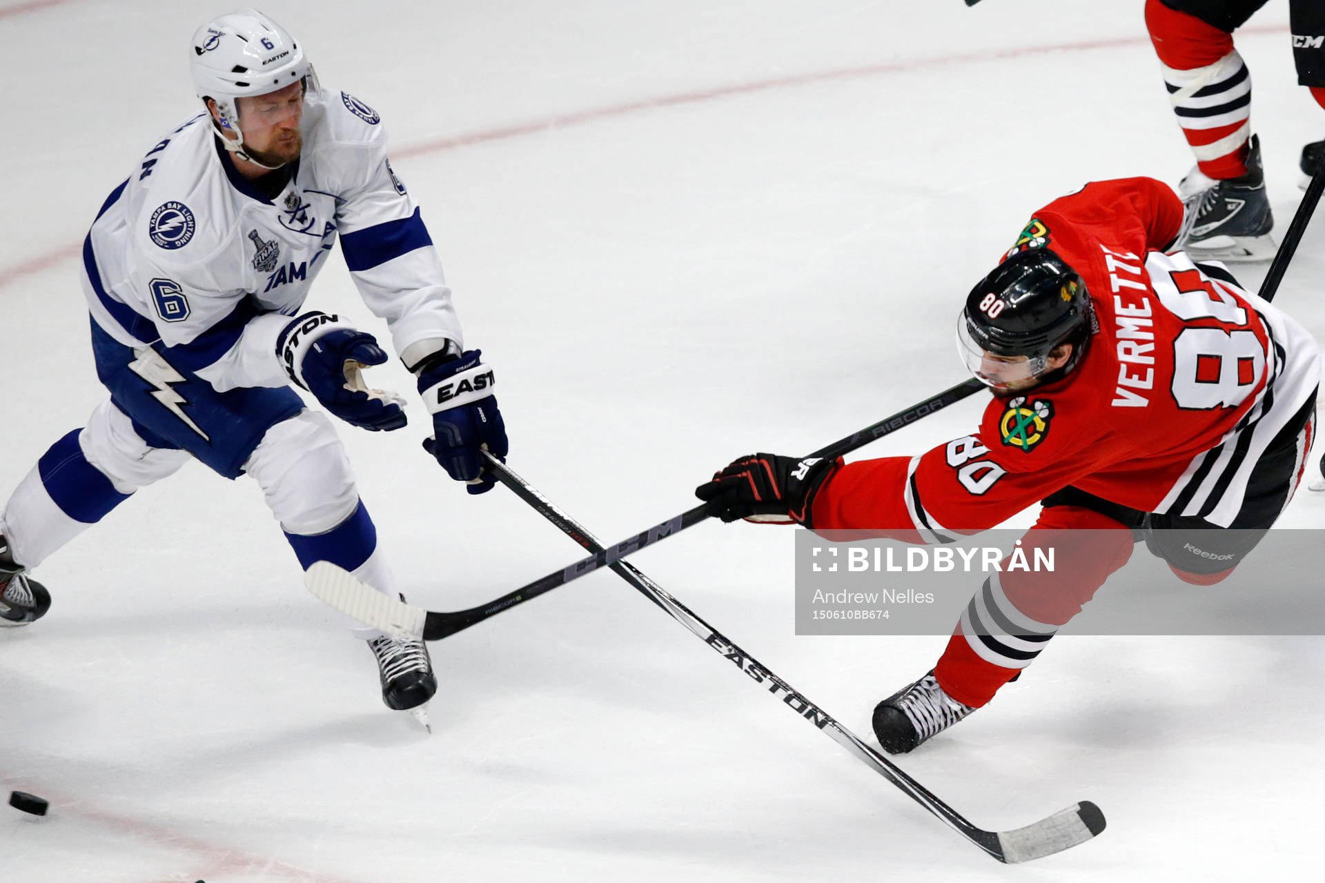 Chicago Blackhawks center Antoine Vermette (80) shoots past