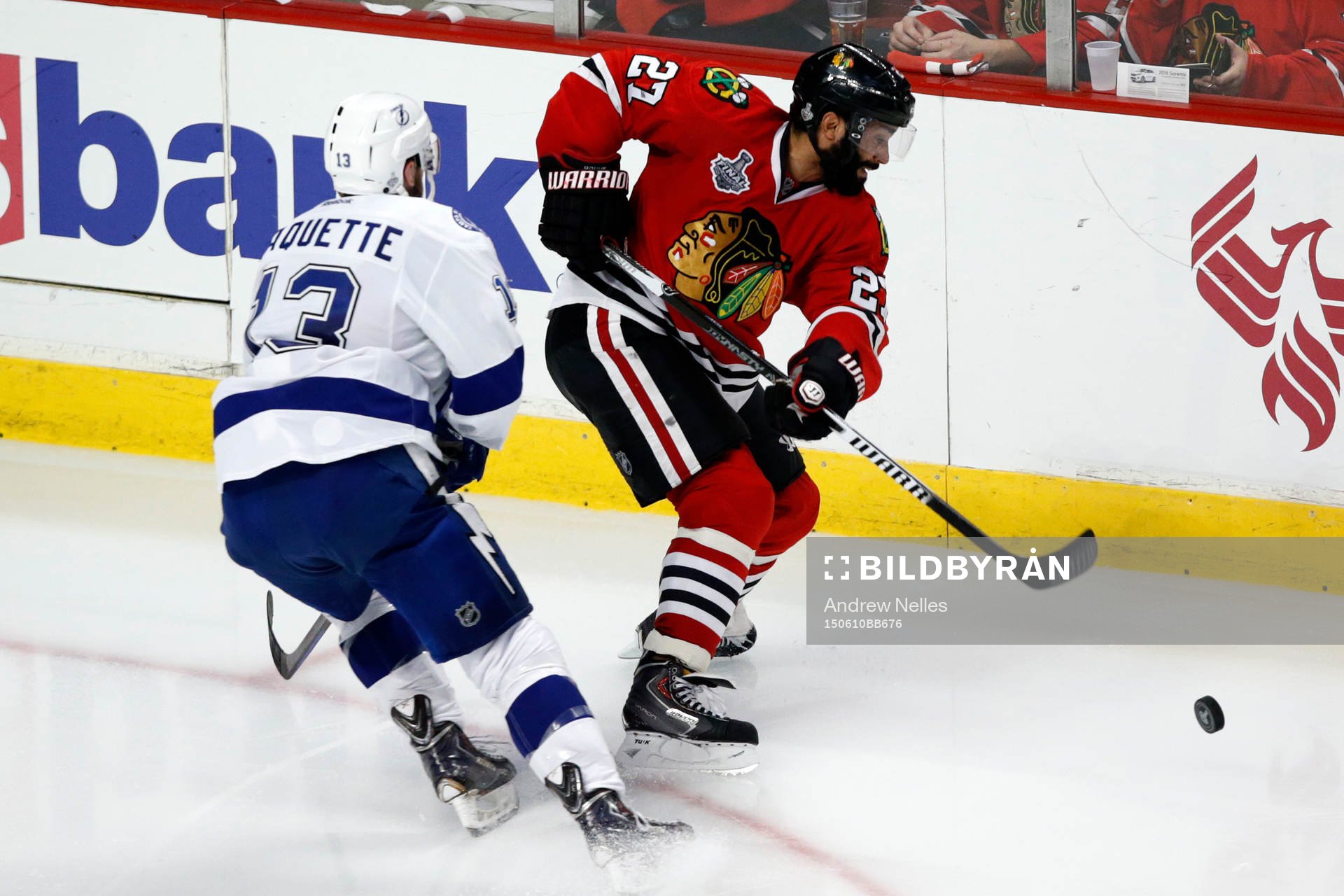 Chicago Blackhawks defenseman Johnny Oduya (27) battles