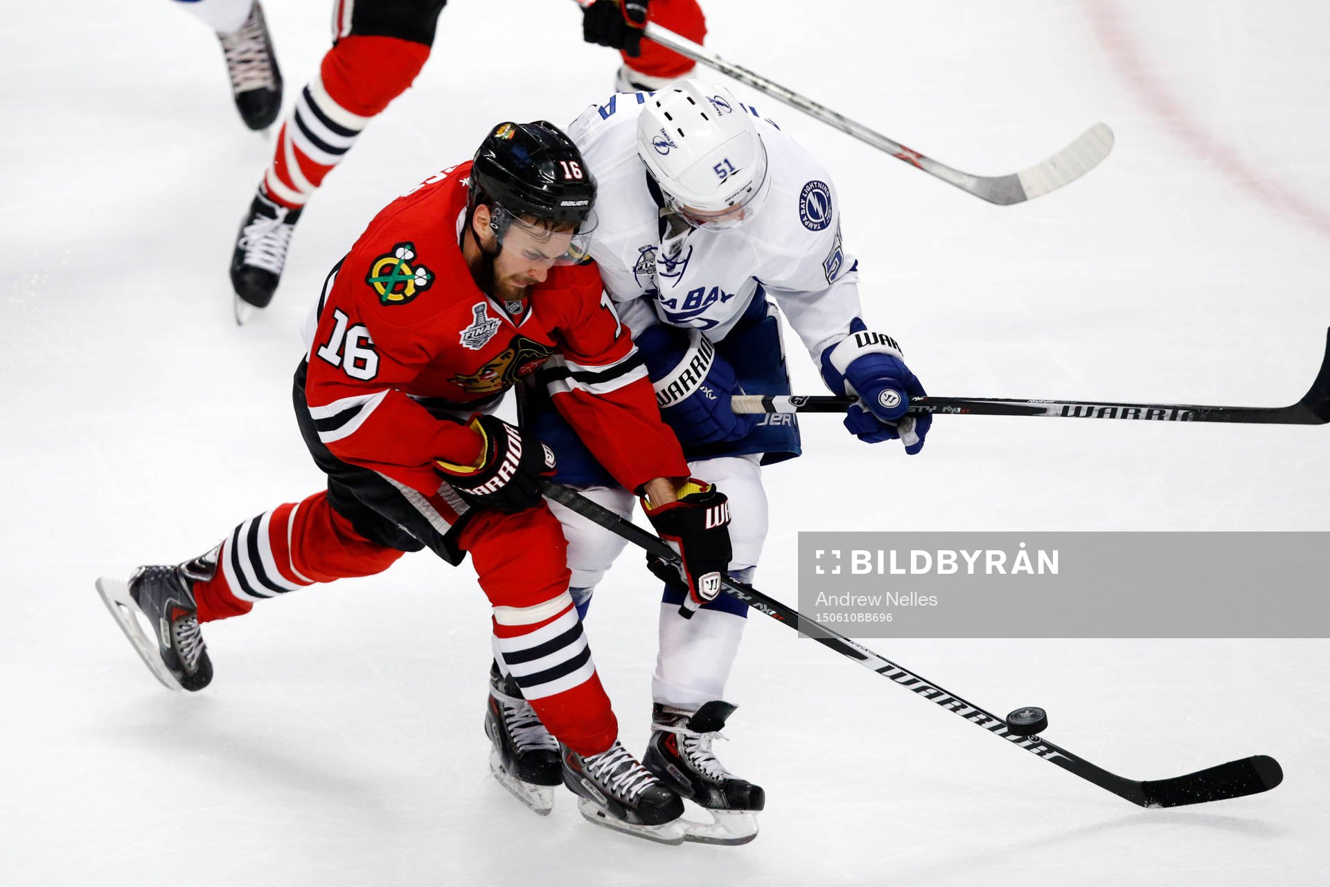 Chicago Blackhawks center Marcus Kruger (16) and Tampa Bay