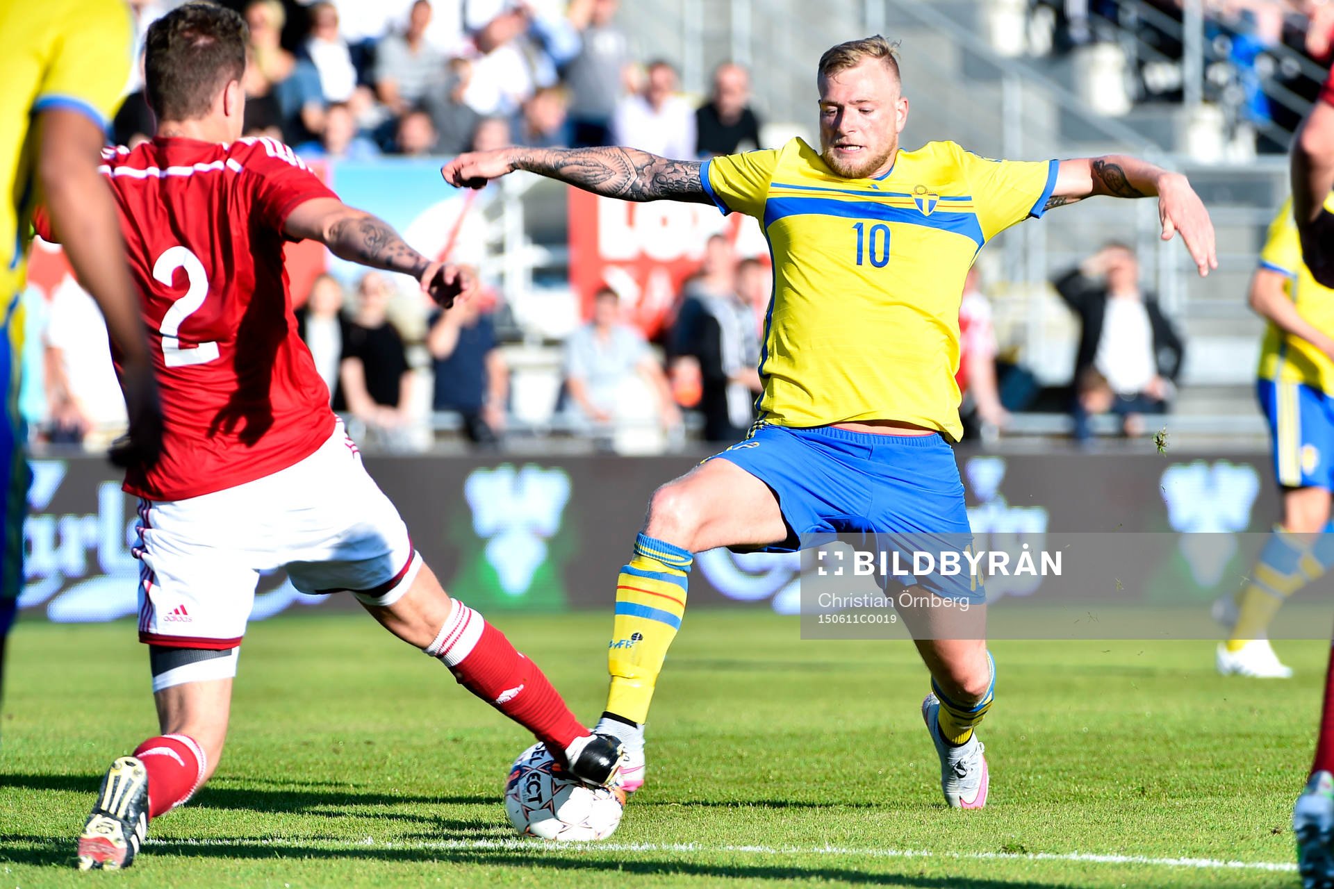 Danmarks Alexander Scholz och Sveriges John Guidetti