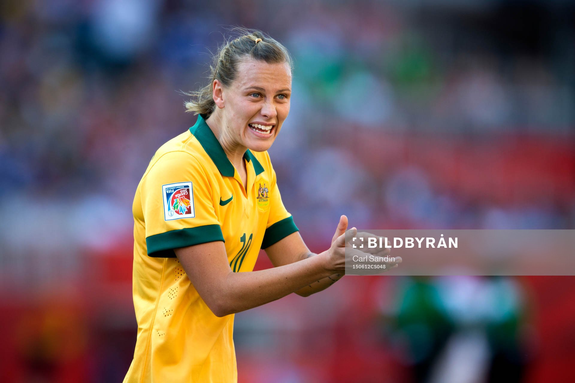 Australiens Emily van Egmond jublar under fotbollsmatchen i VM mellan Australien och Nigeria den 12 juni 2015 i Winnipeg.