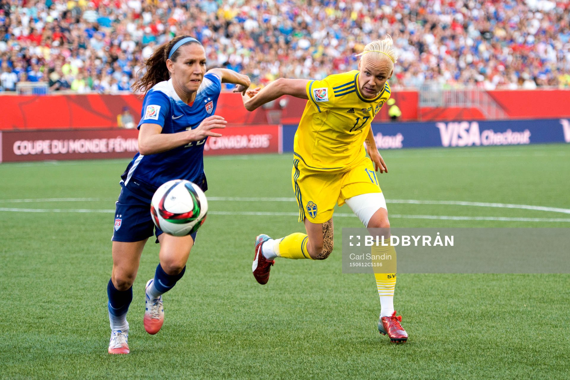 s Lauren Holiday och Sveriges Caroline Seger