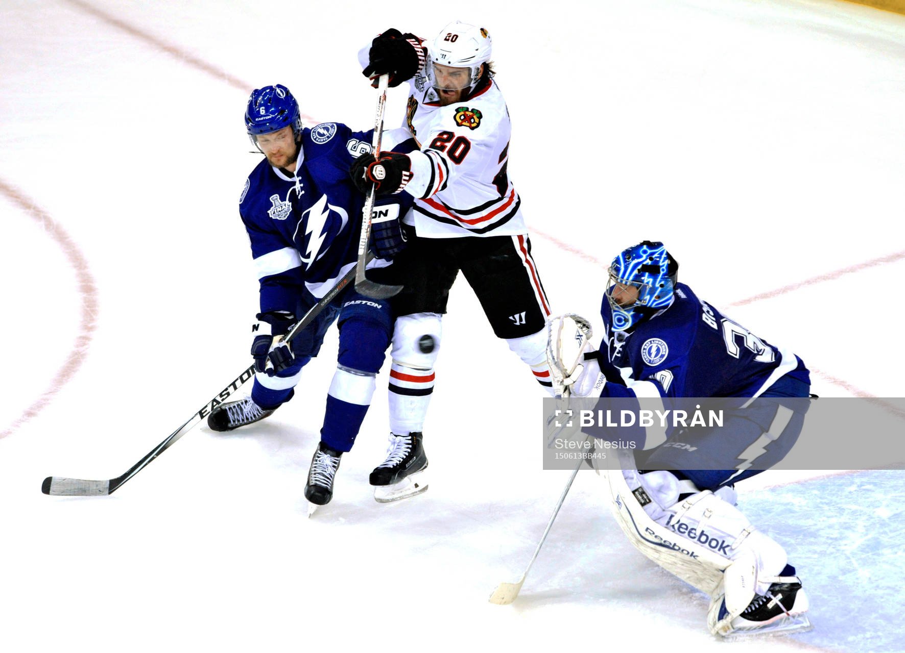 Tampa Bay's Anton Stralman (6) defends Chicago's Brandon
