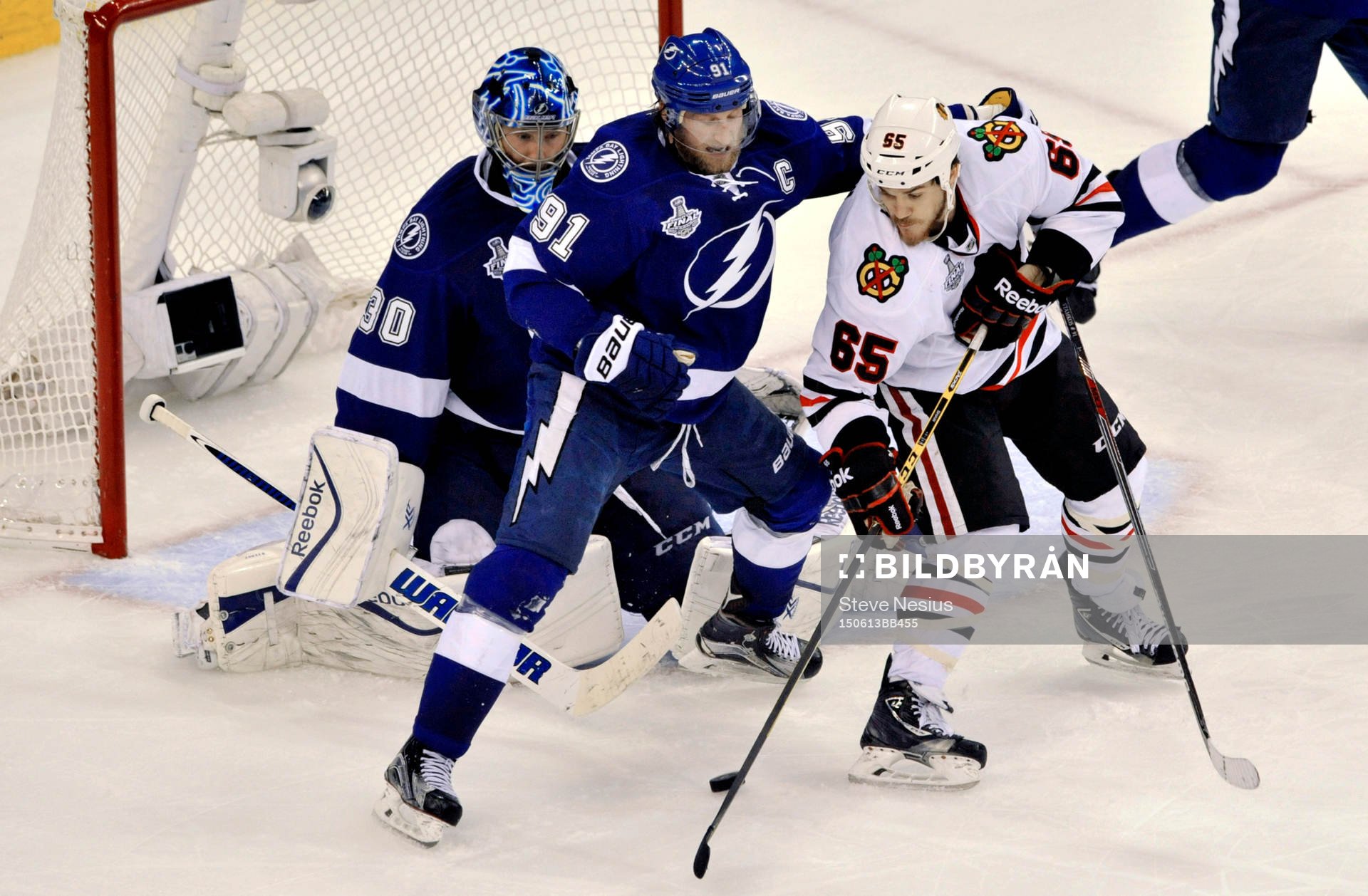 Tampa Bay's Steven Stamkos (91) and goalie Ben Bishop (30)