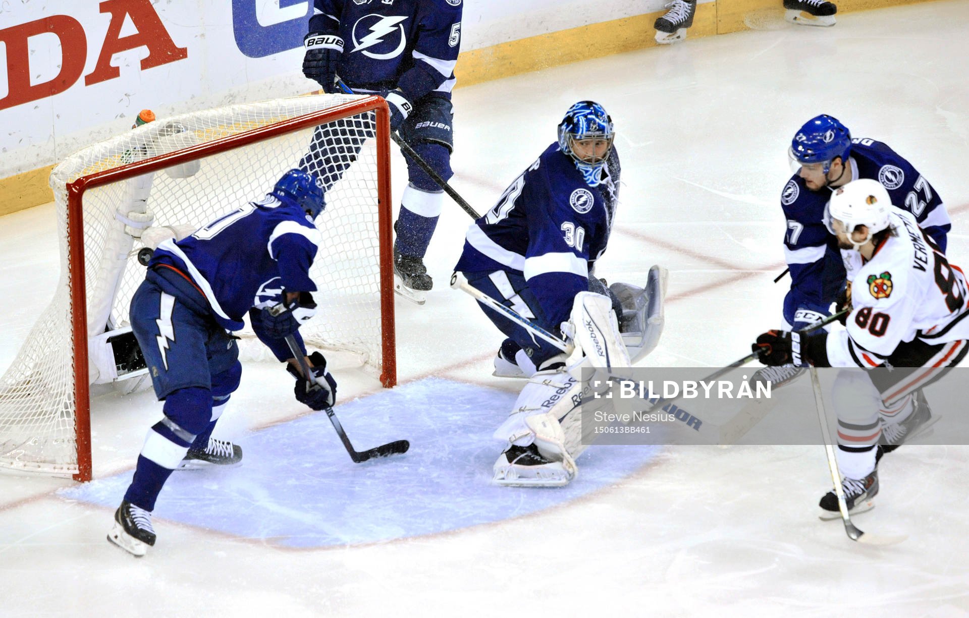 Chicago's Antoine Vermette (80) scores the game-winning