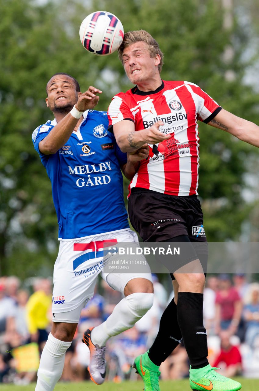 Salif Camara Jönsson från Trelleborg från Trelleborg och Sebastian Sköld från Höllviken under fotbollsmatchen i div 1 mellan Höllviken och Trelleborg den 13 juni 2015 i Höllviken