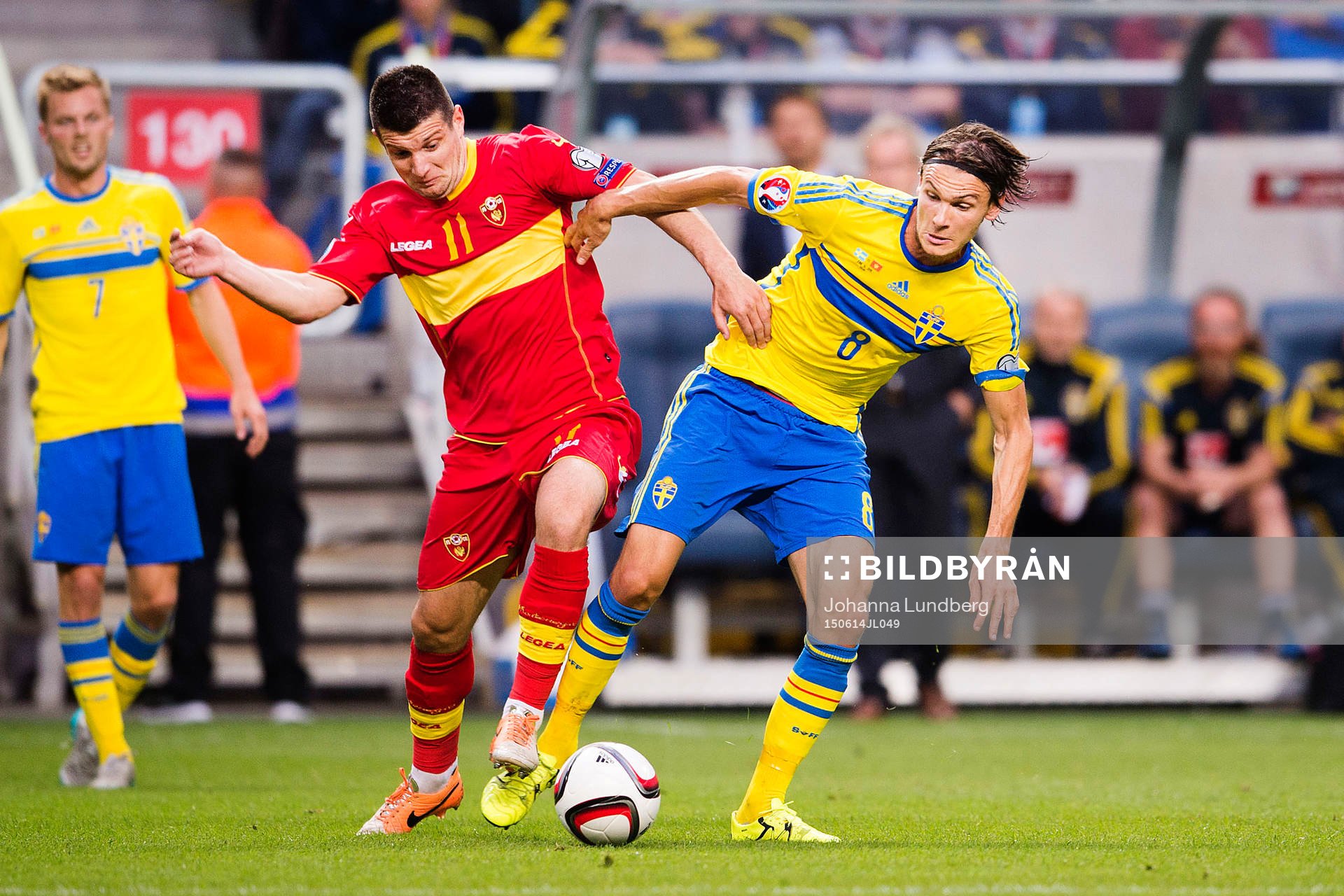 Montenegros Fatos Beciraj och Sveriges Albin Ekdal under EM-kvalet i fotboll mellan Sverige och Montenegro den 14 juni 2015 i Stockholm.