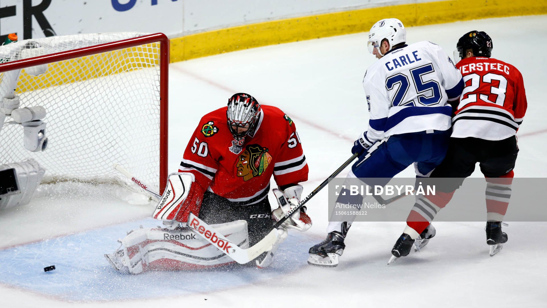 Chicago Blackhawks goalie Corey Crawford (50) and left wing