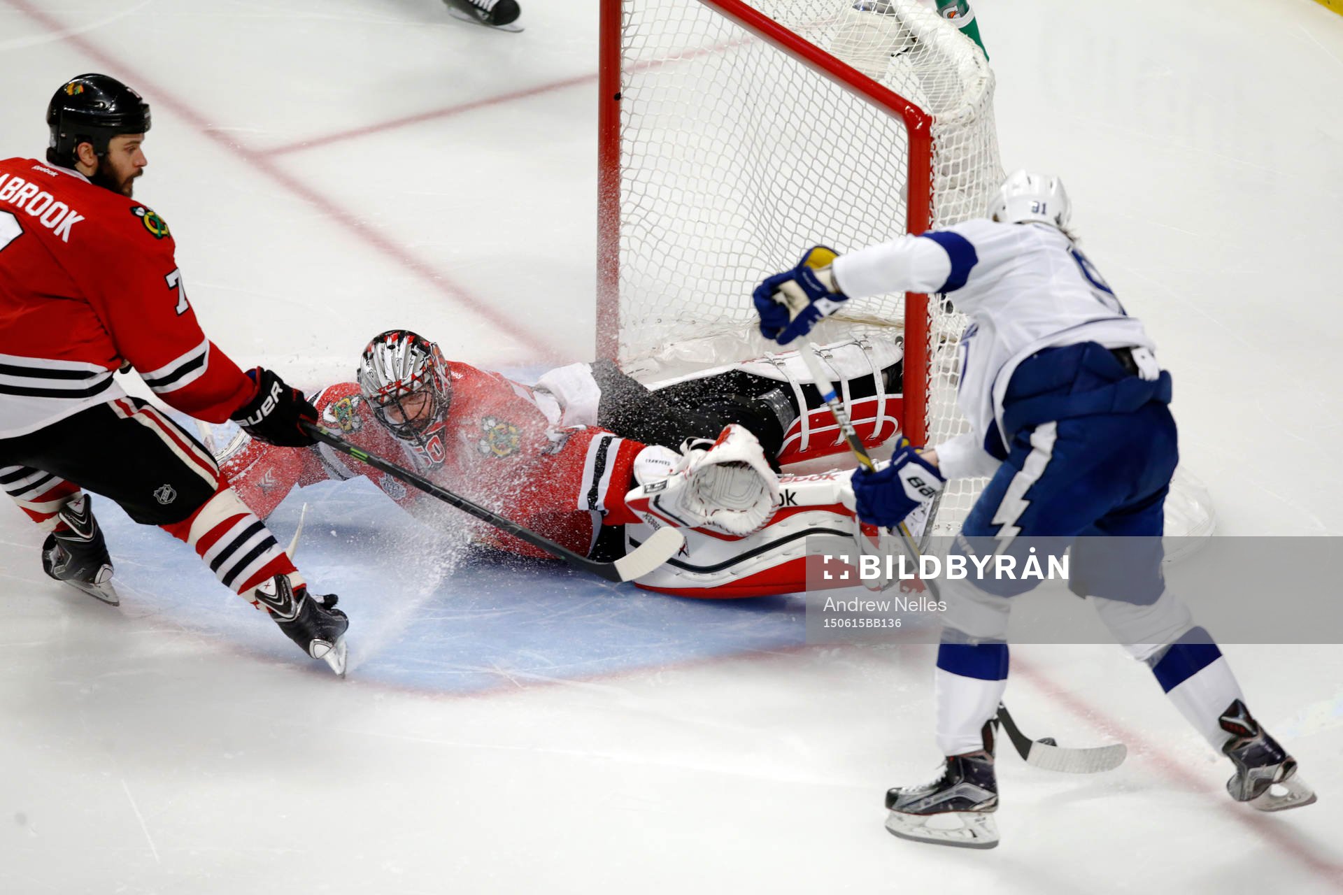 Chicago Blackhawks goalie Corey Crawford (50) defends