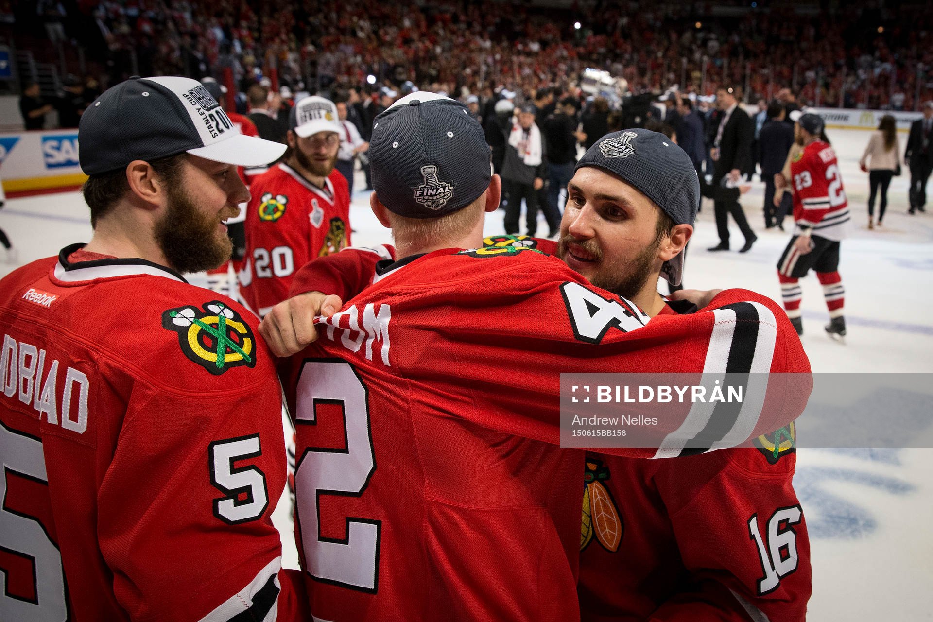Chicago Blackhawks center Marcus Kruger (16) hugs left wing