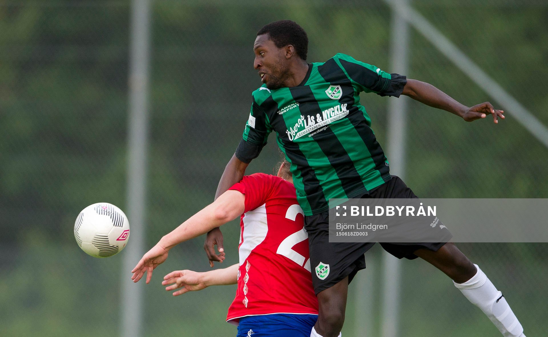 Höganäs Måns Carlsen i nickduell mot Högaborgs Fllorent Krasnniqi under fotbollsmatchen i div 2 västra götaland mellan Höganäs BK och Högaborgs BK den 18 juni 2015 i Höganäs.